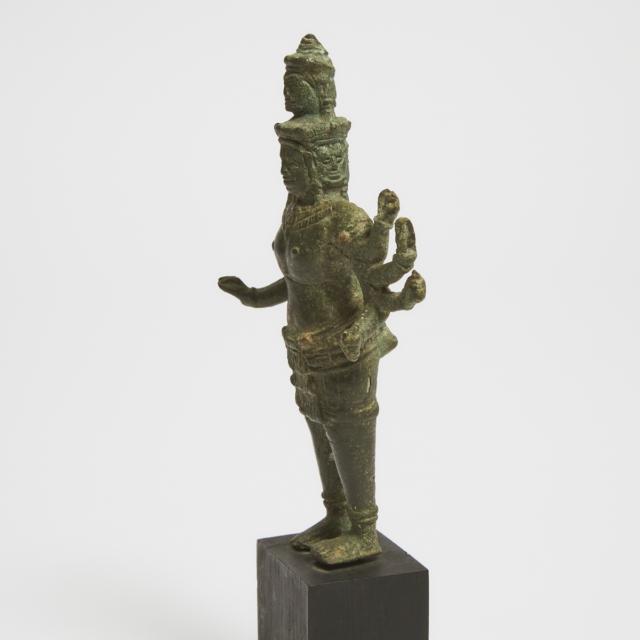 A Khmer Bronze Figure of Shiva, 14th Century