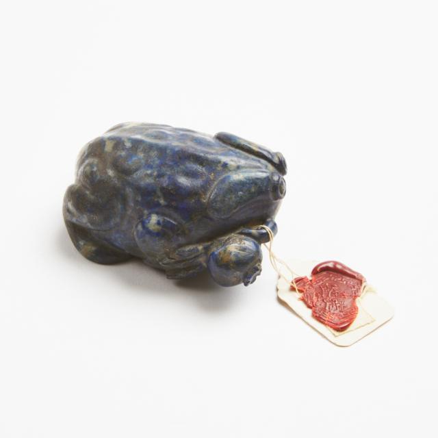A Chinese Lapis Lazuli Carving of a Toad and Pomegranate, Qing Dynasty, 19th Century
