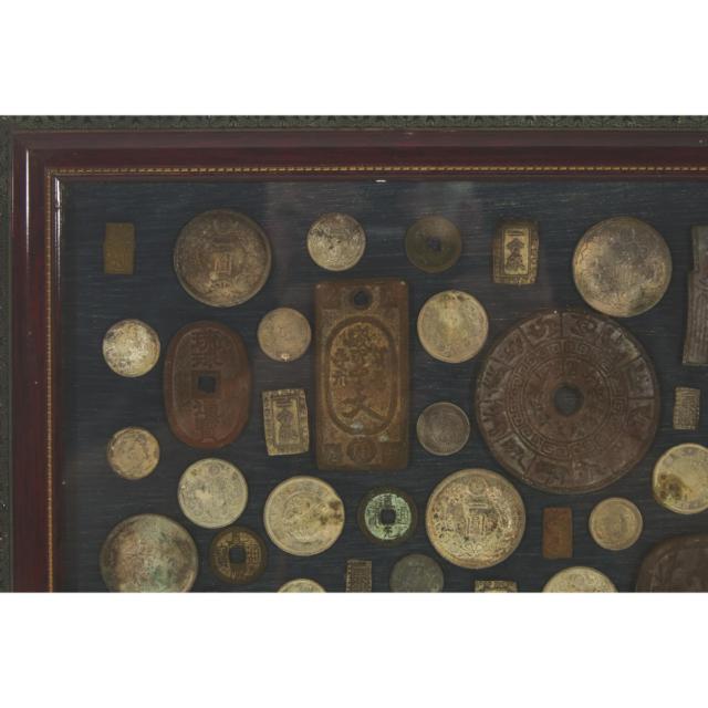A Large Collection of Sixty-Five Japanese and Chinese Coins