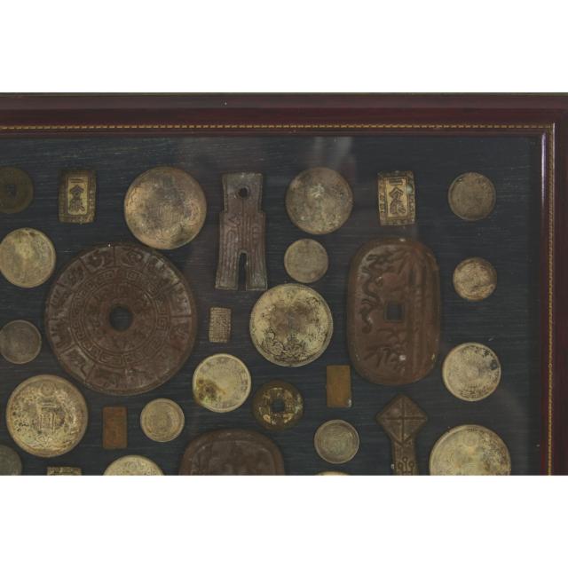 A Large Collection of Sixty-Five Japanese and Chinese Coins