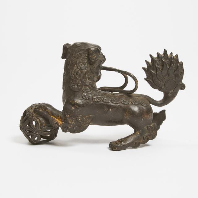 A Gilt Bronze Figure of a Lion, Ming/Qing Dynasty