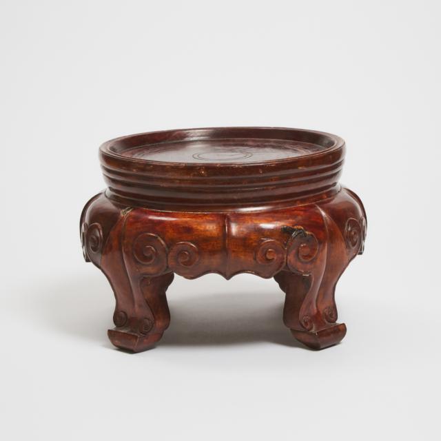A Large Chinese Carved Hardwood Stand, 19th/Early 20th Century