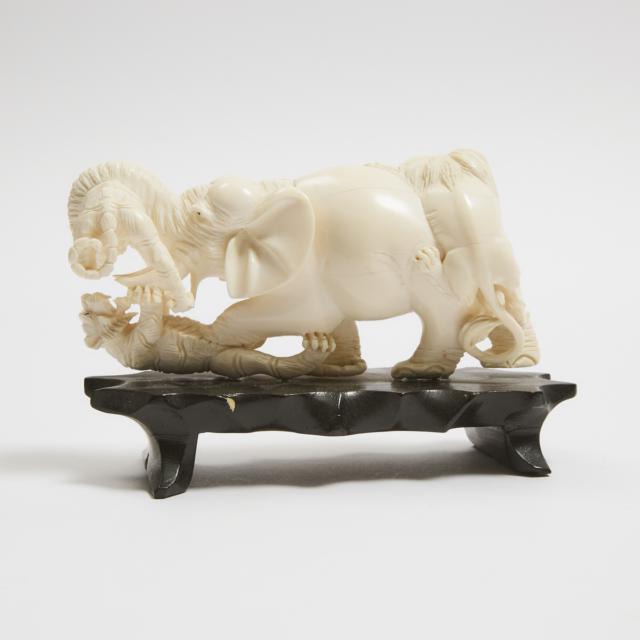 An Ivory 'Elephant and Tiger' Group, Mid 20th Century