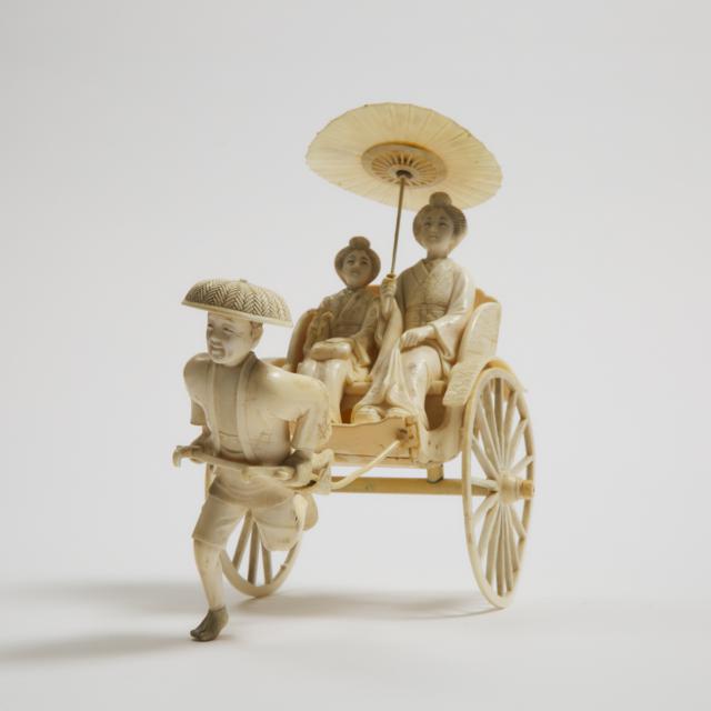 An Ivory Okimono of Two Ladies in a Rickshaw, Meiji Period (1868-1912)