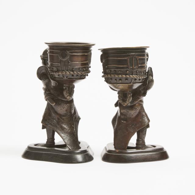 A Pair of Bronze Okimono Figures Carrying Temple Bells, Meiji Period (1868-1912)
