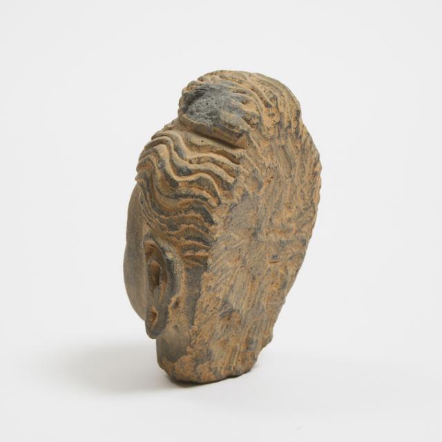 A Gandhara Style Stone Schist Head of a Buddha, Pakistan