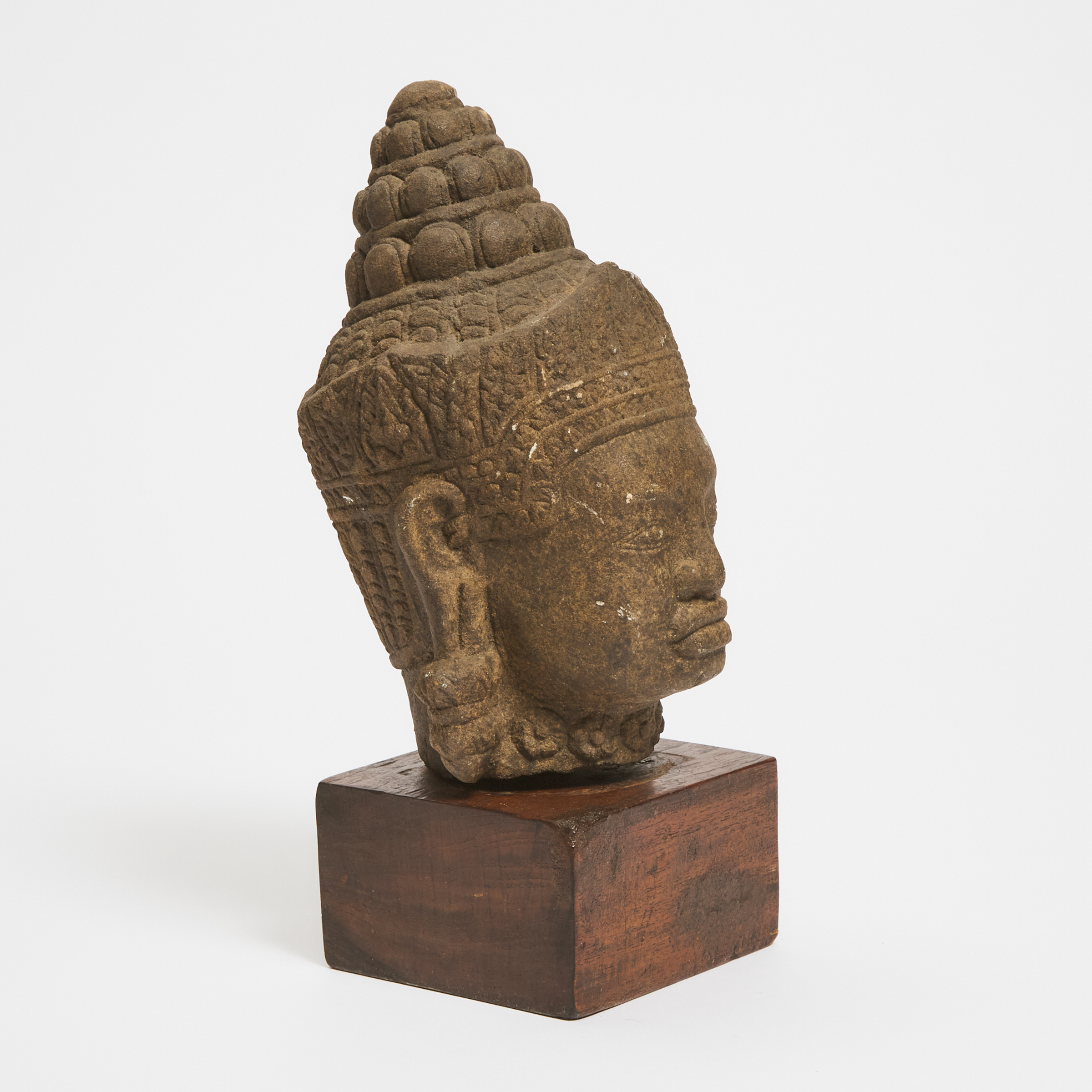 A Khmer Stone Head of Buddha, 14th Century