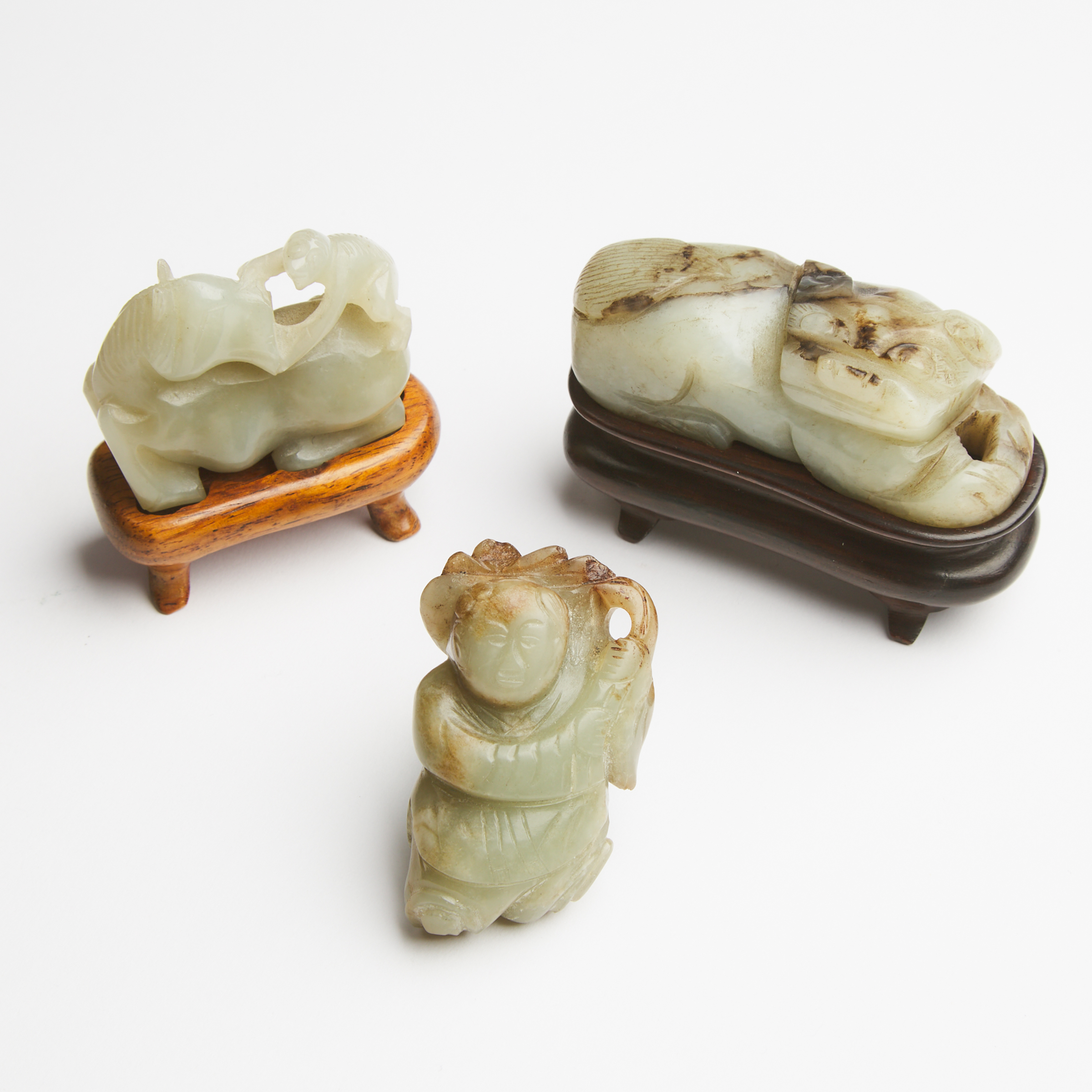 A Group of Three Jade Carvings, Ming Dynasty (1368-1644)