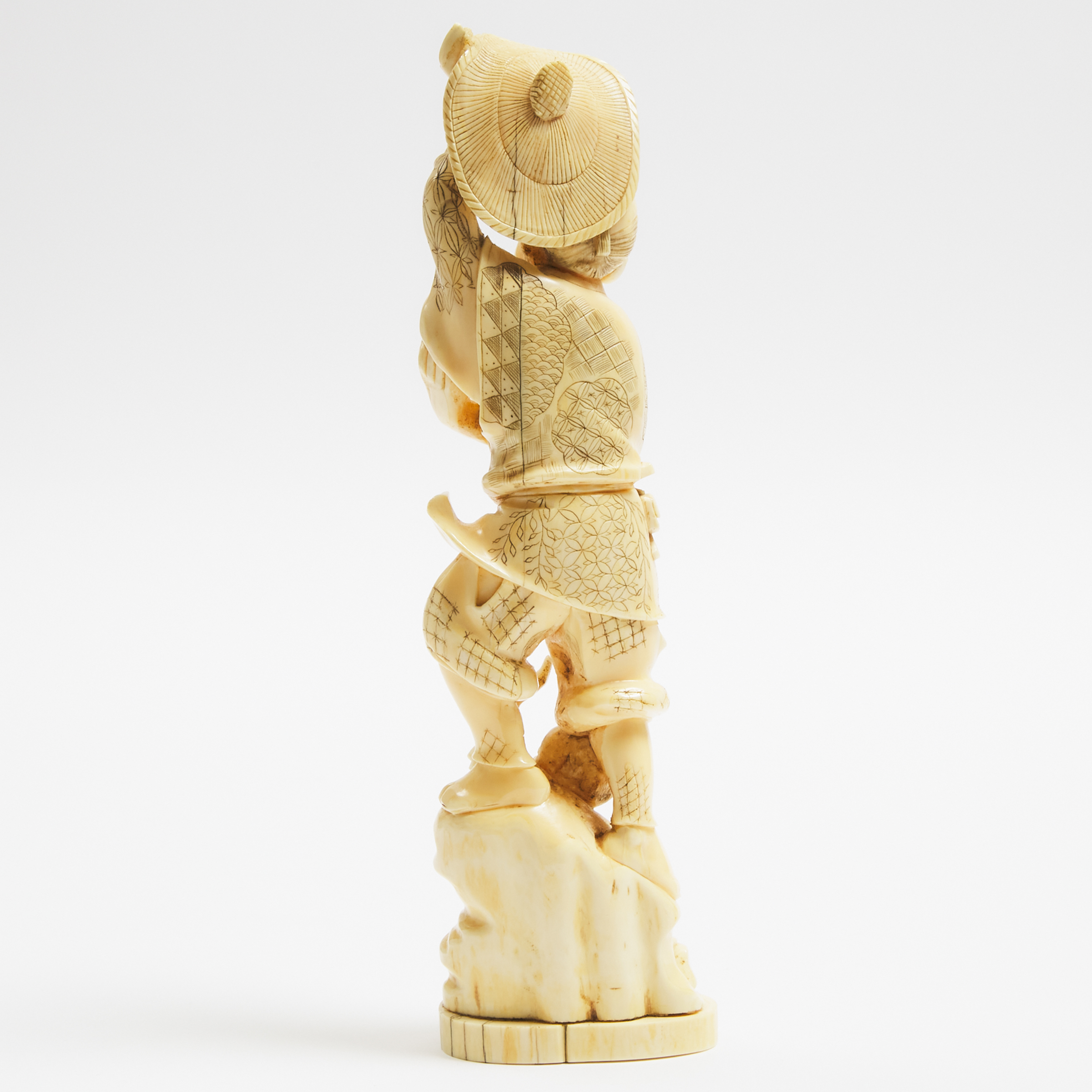 An Ivory Okimono of a Farmer and Child, Early to Mid 20th Century