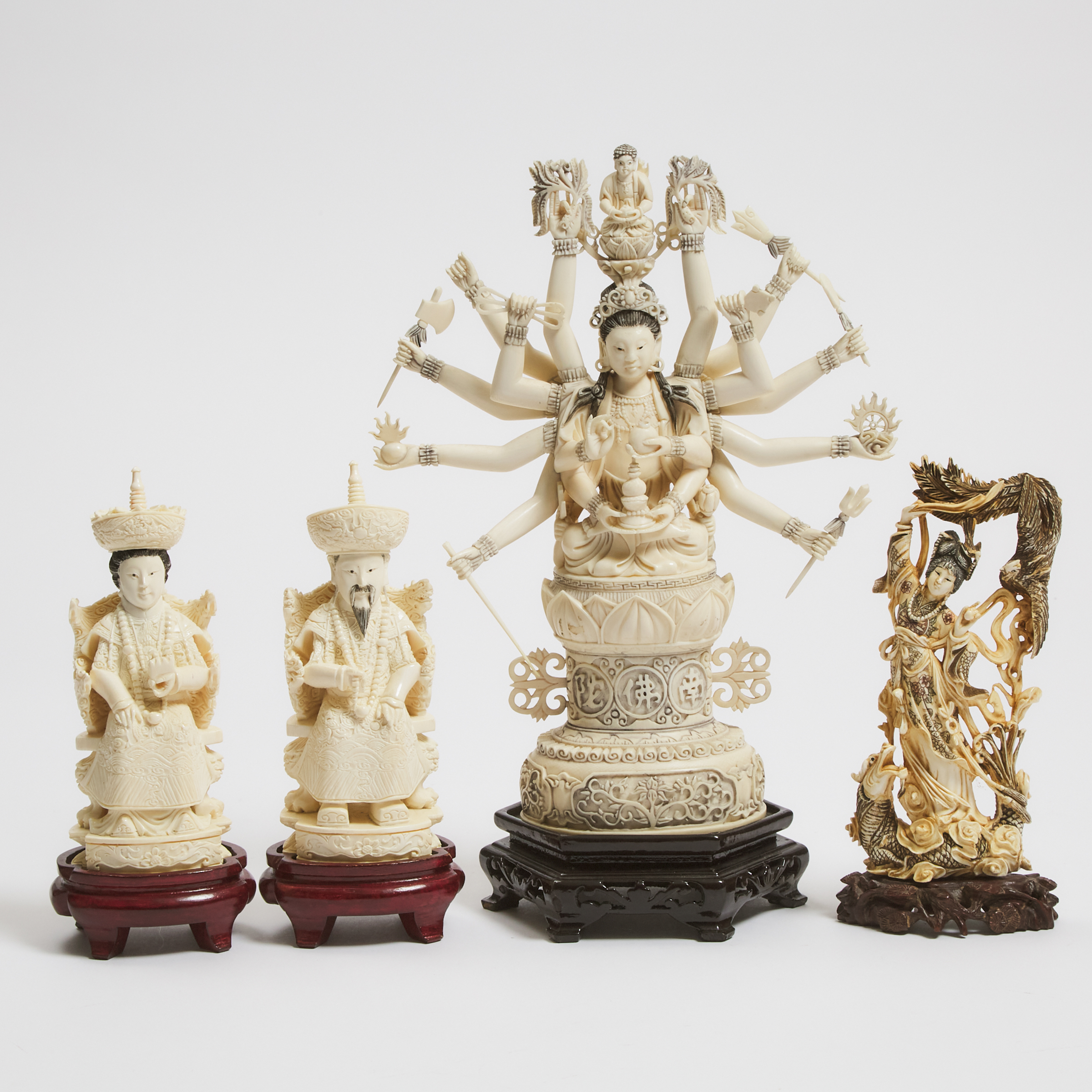 An Ivory Figure of Multi-Armed Guanyin, Together With a Emperor and Empress Pair and a Female Immortal, Mid 20th Century