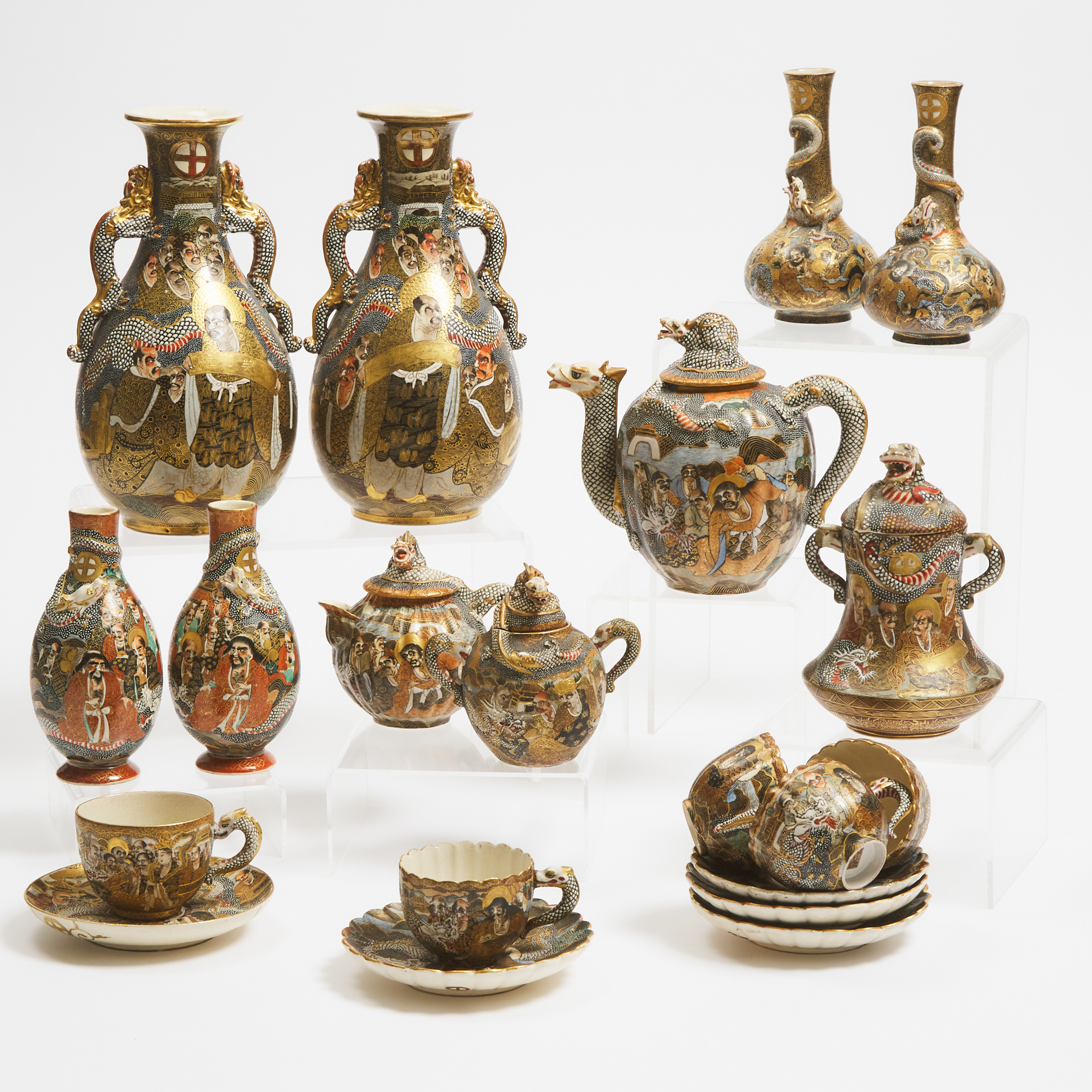 A Group of Fifteen Satsuma 'Dragon and Rakan' Tea Wares and Vases, Taisho Period (1912-1926)
