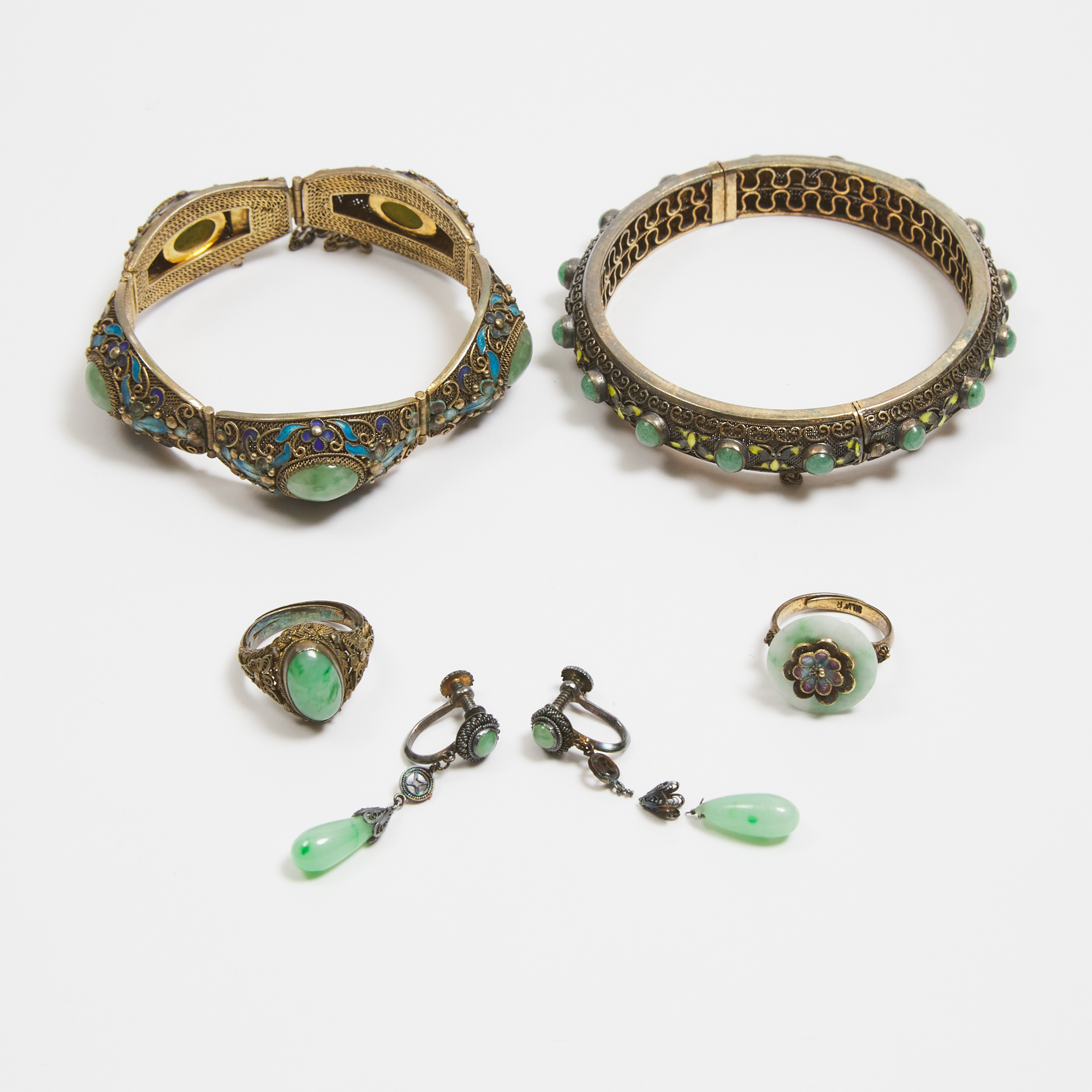 A Group of Six Chinese Gilt and Enameled Silver Filigree Jewellery Pieces with Jadeite Inlays, 19th/20th Century