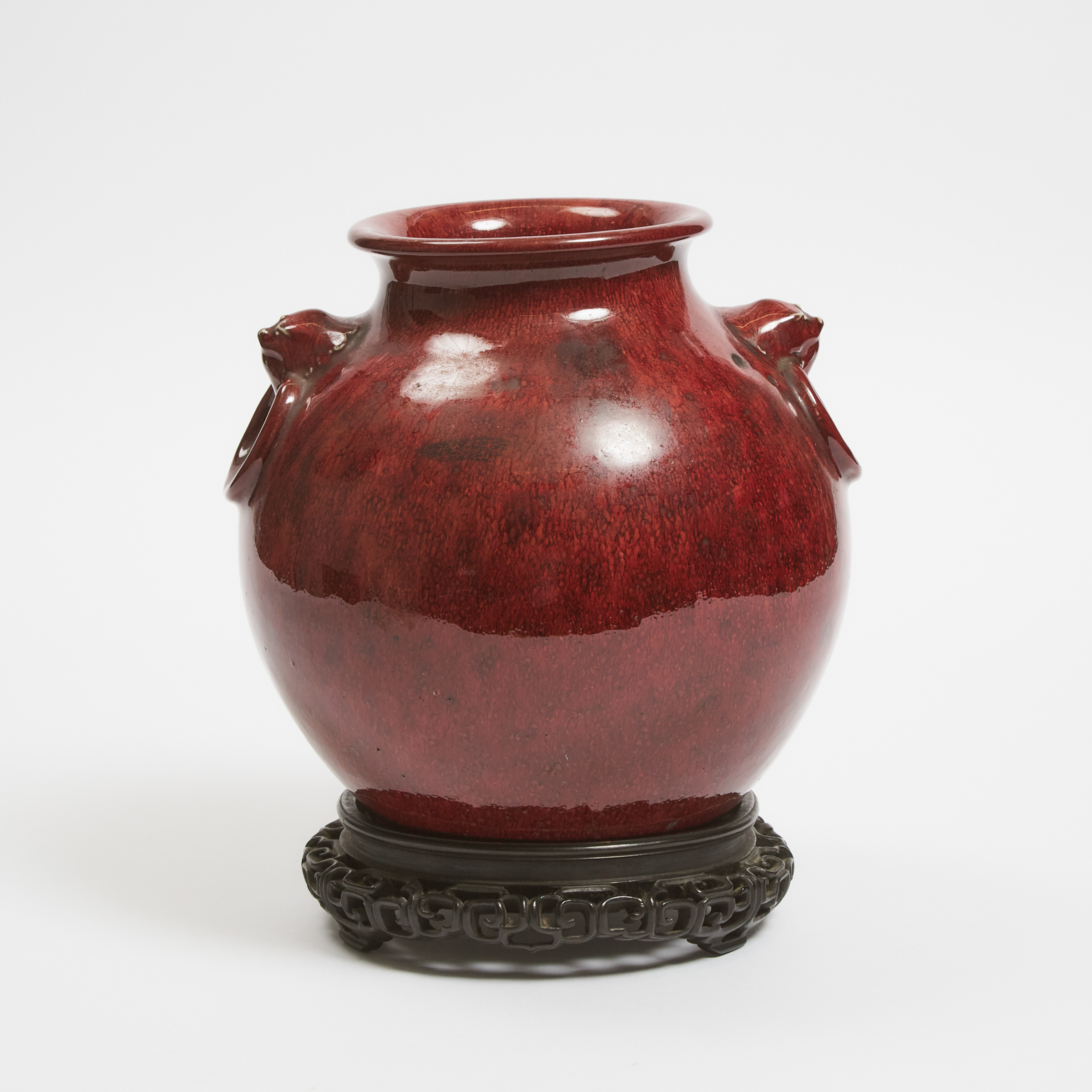 A Large Flambé-Glazed Jar with Animal Mask-and-Ring Handles, 19th Century 