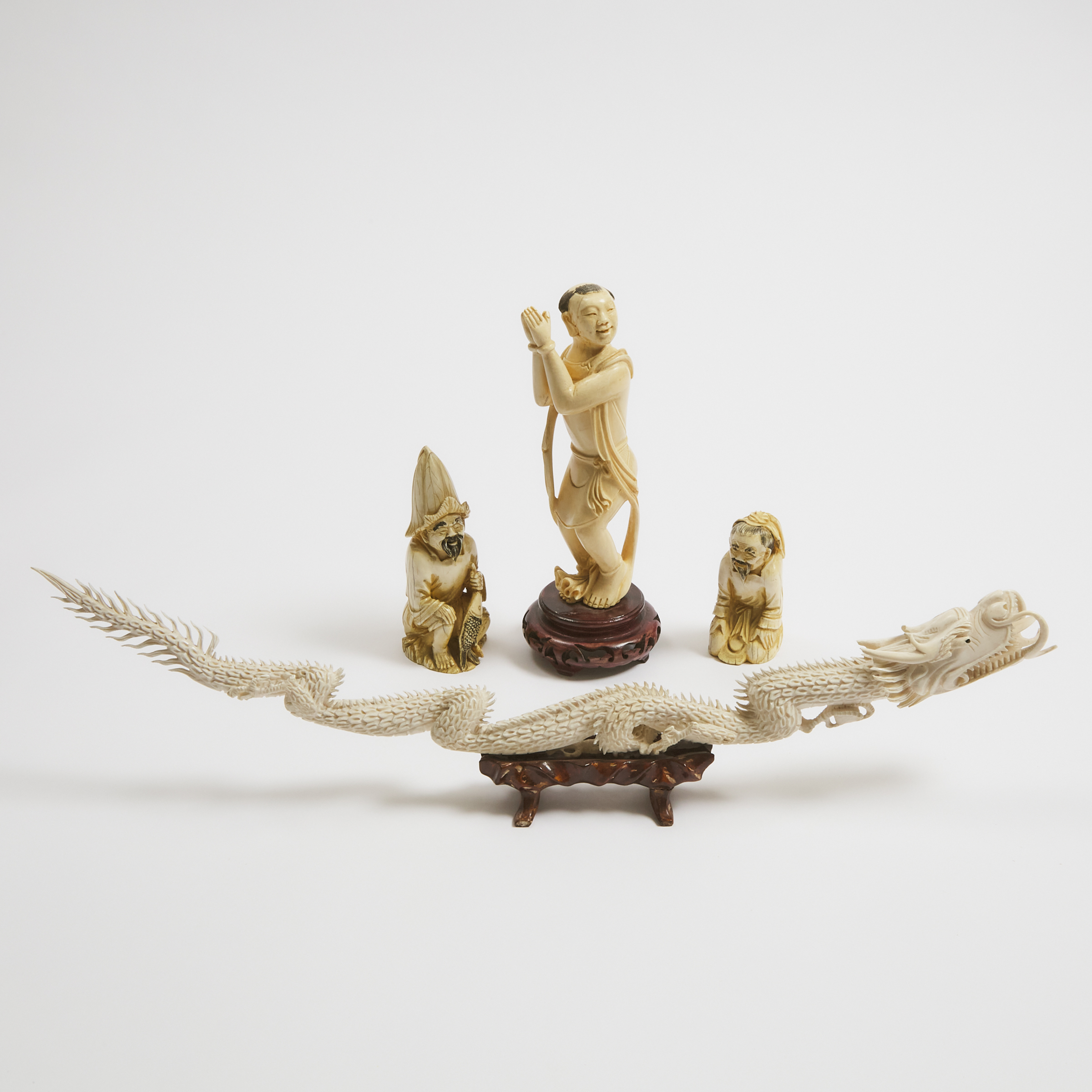 A Group of Four Ivory Carvings, 19th/20th Century
