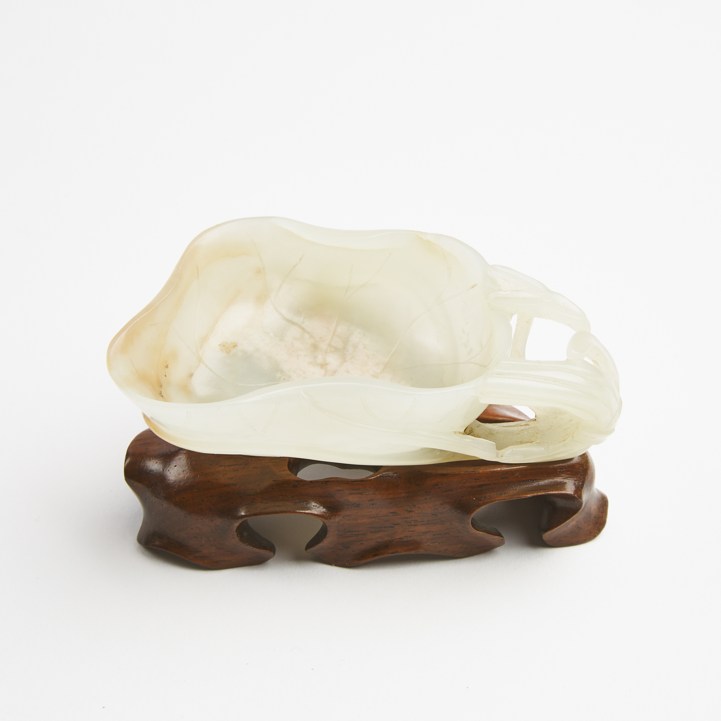 A White Jade Carved 'Lotus' Libation Cup, Ming Dynasty (1368-1644)