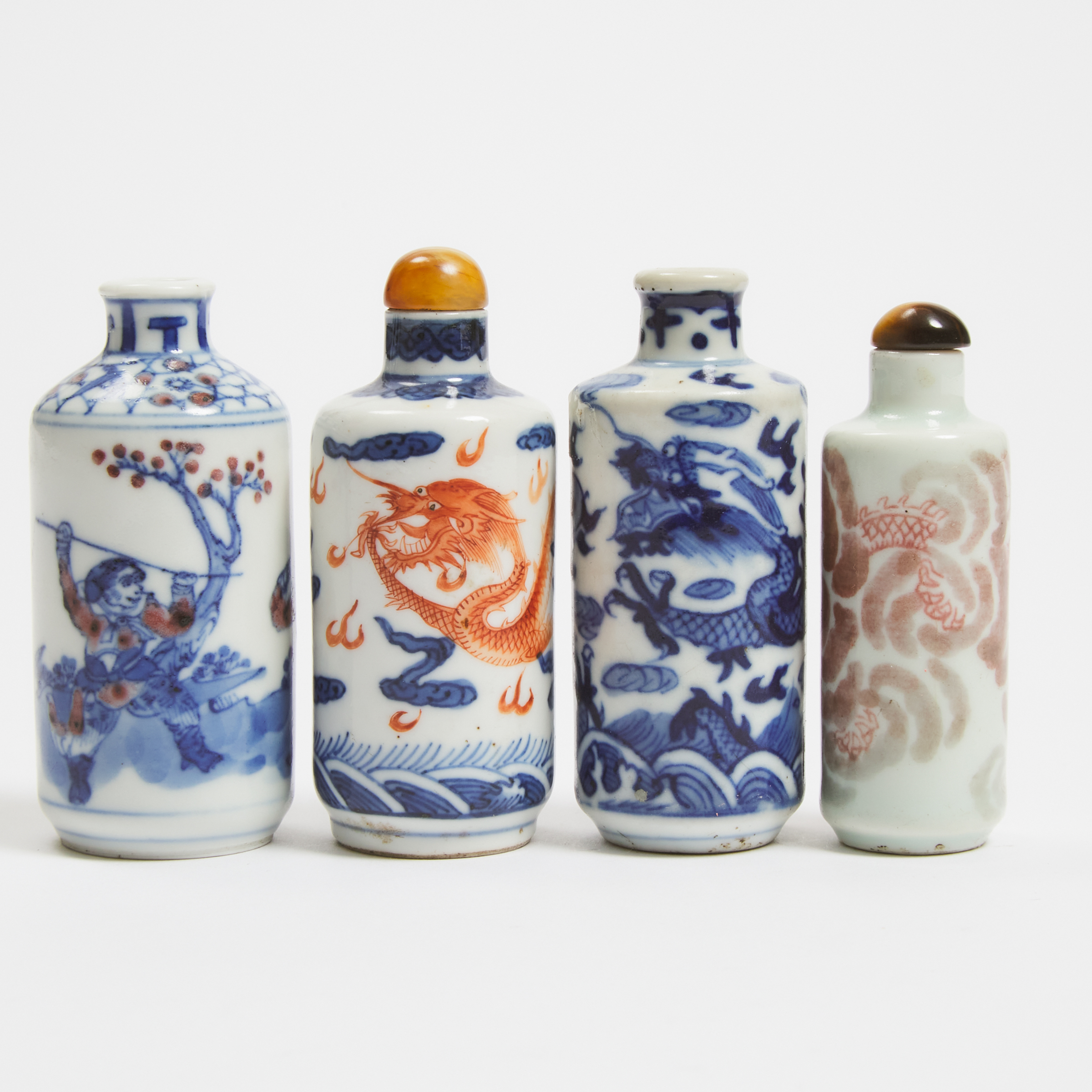A Group of Four Porcelain Snuff Bottles, 19th Century