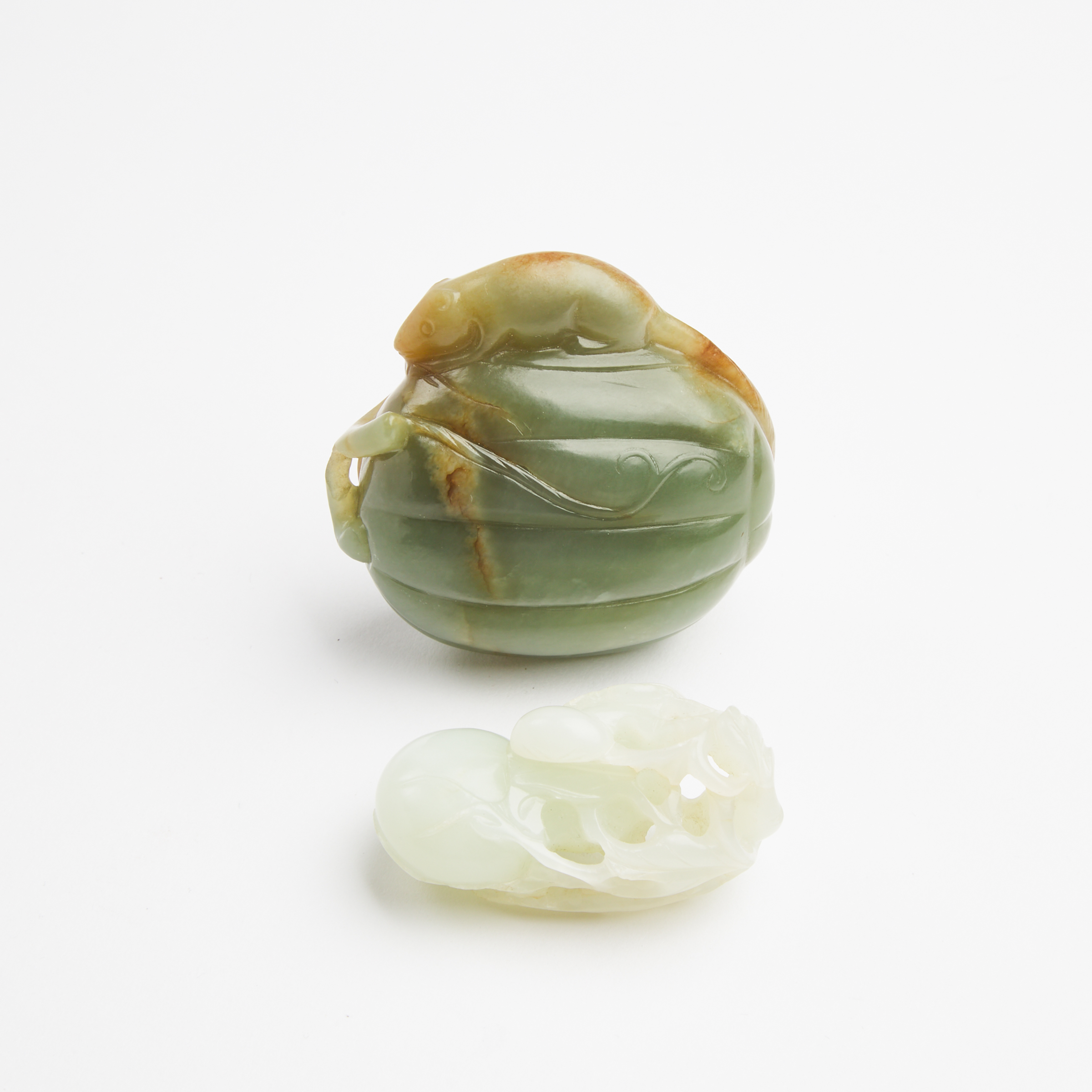 A White Jade 'Double-Gourd' Pendant, Together With a Celadon Jade 'Squirrel and Melon' Carving, Qing Dynasty 