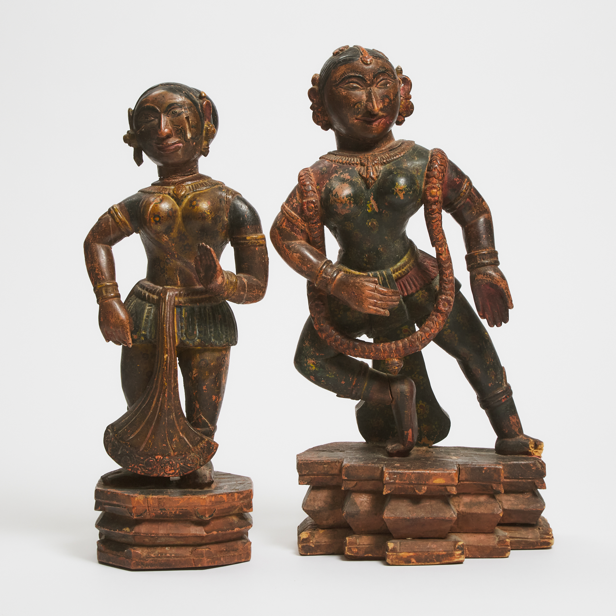 A Pair of Indian Painted Wood Figures of Female Dancers, 18th/19th Century