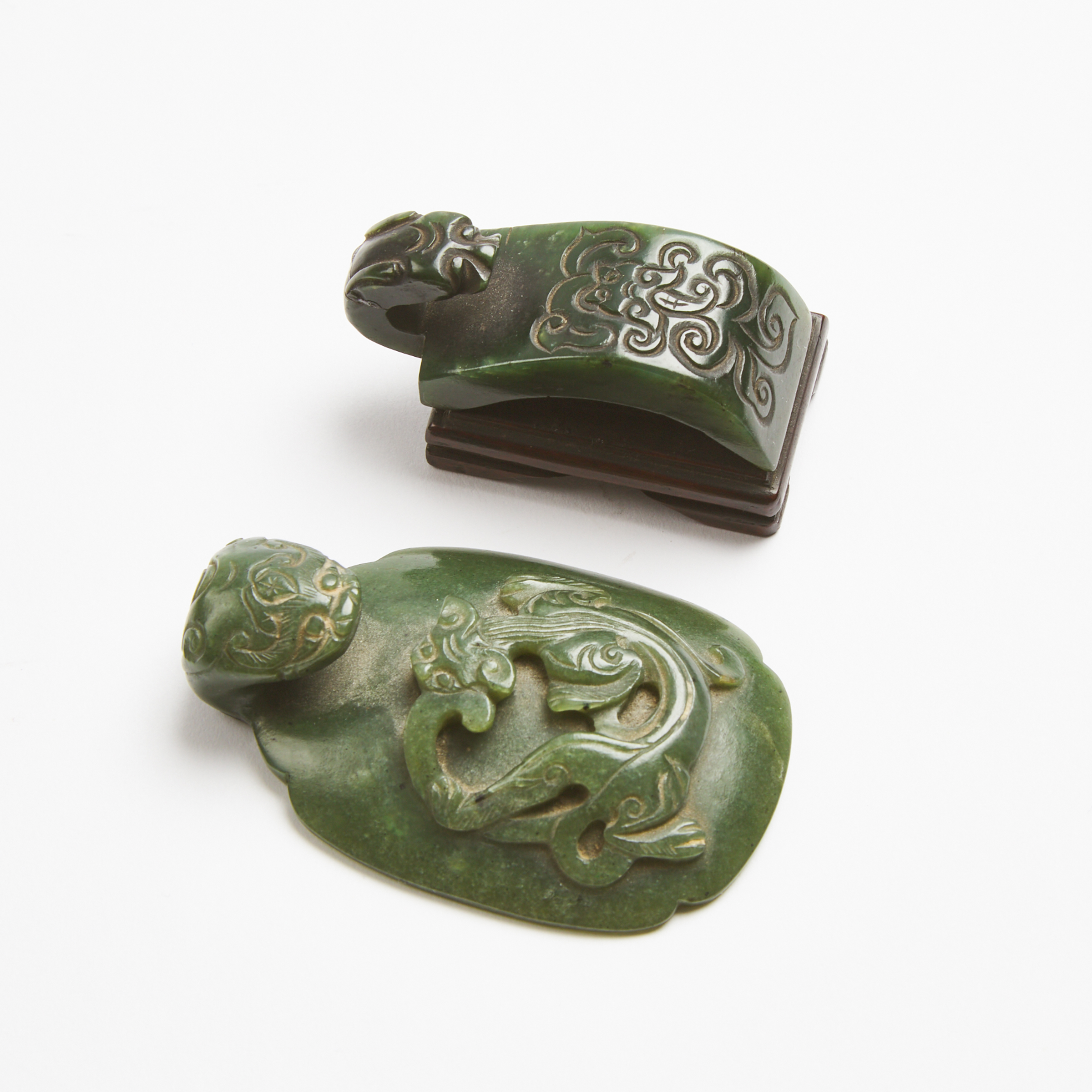 Two Spinach Jade 'Chilong' Belt Buckles, Ming Dynasty (1368-1644)