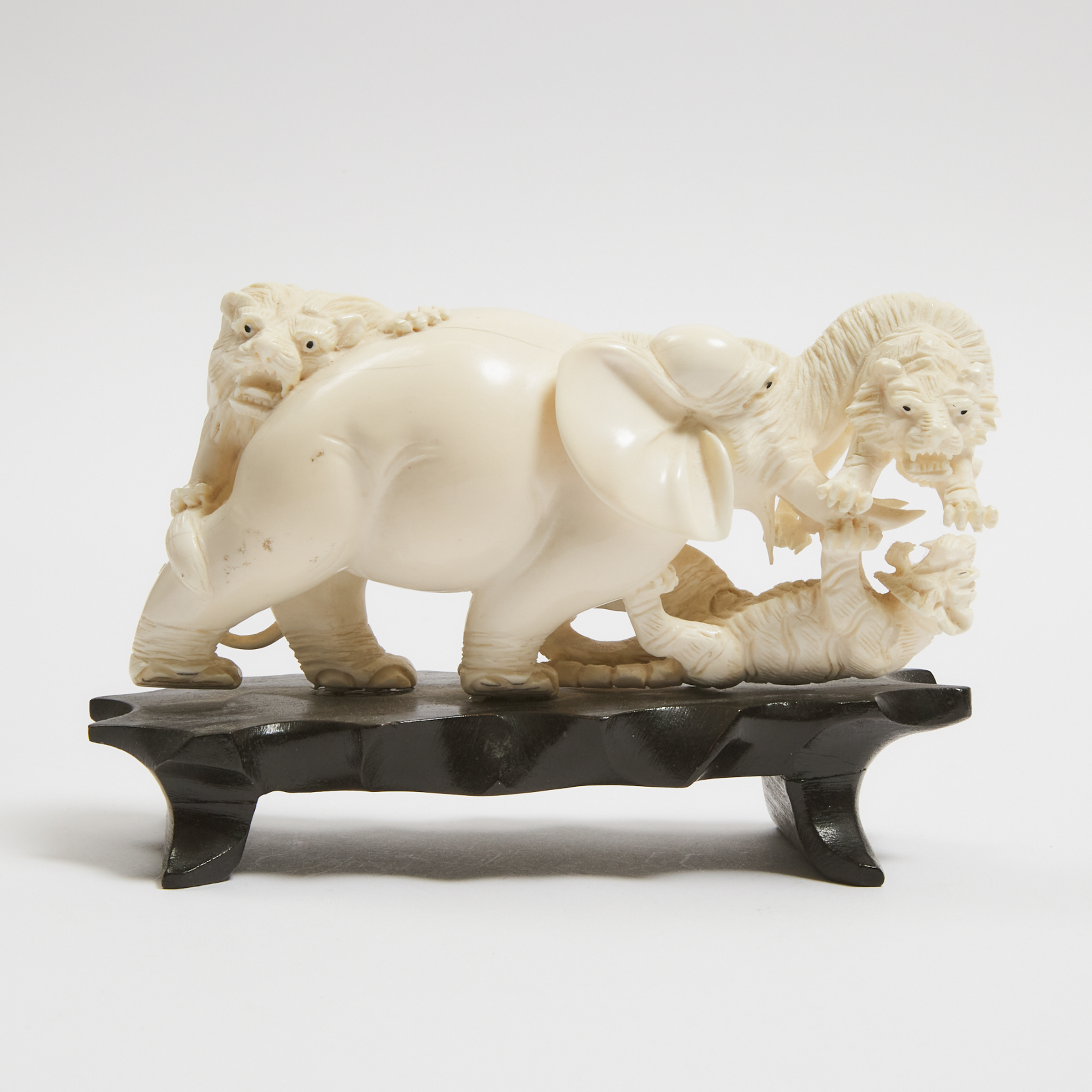 An Ivory 'Elephant and Tiger' Group, Mid 20th Century