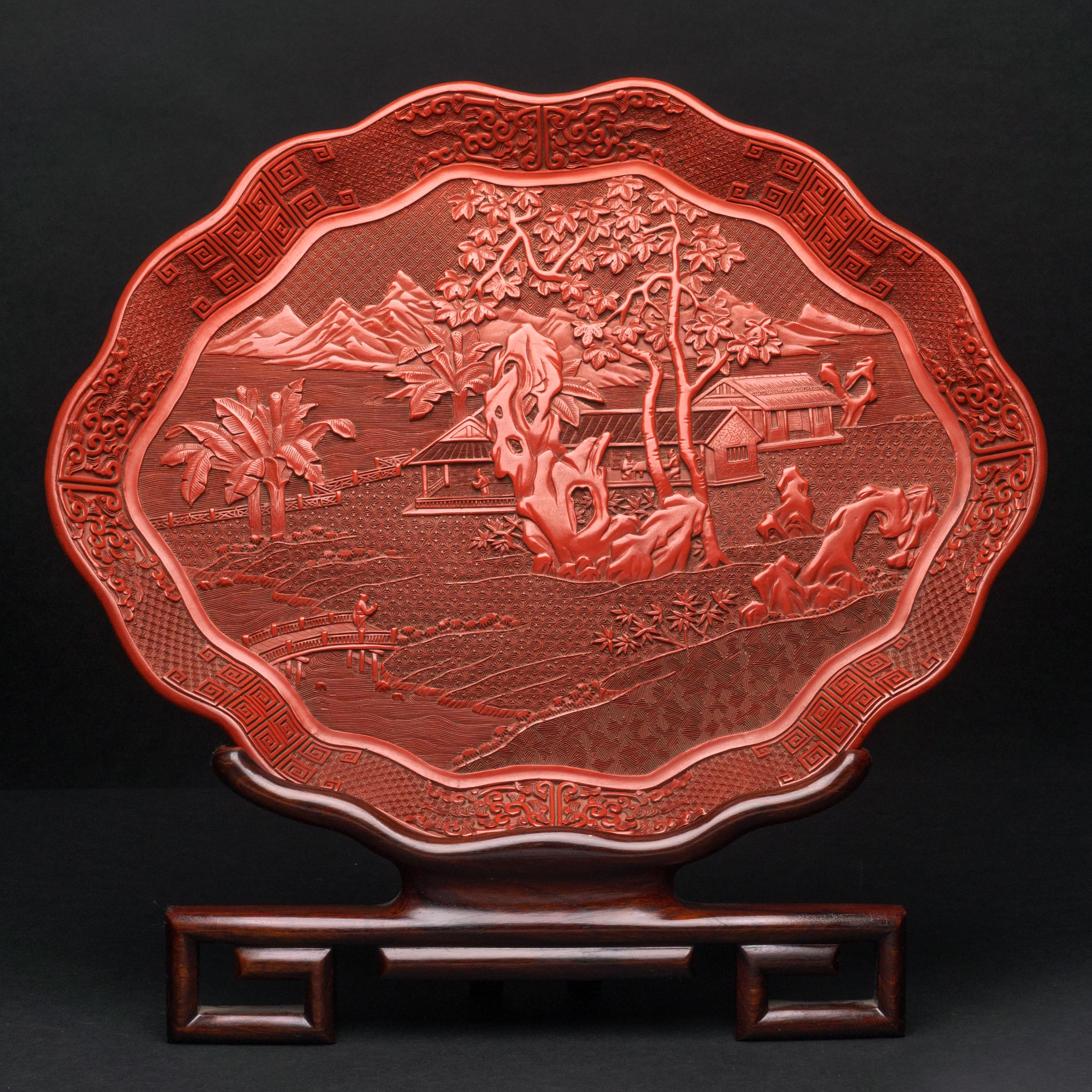 A Carved Cinnabar Lacquer Lobed Tray, Qianlong Mark, 20th Century