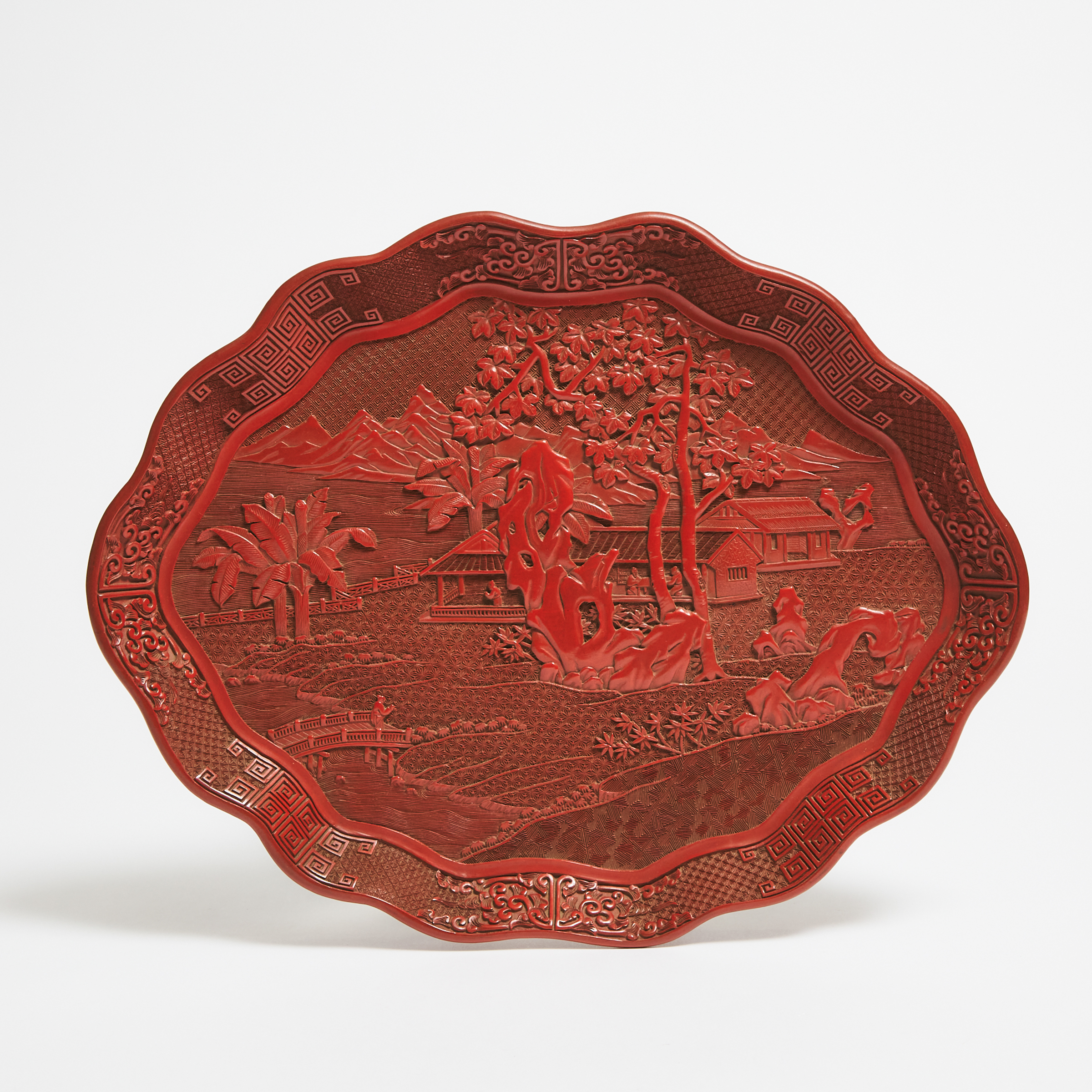 A Carved Cinnabar Lacquer Lobed Tray, Qianlong Mark, 20th Century