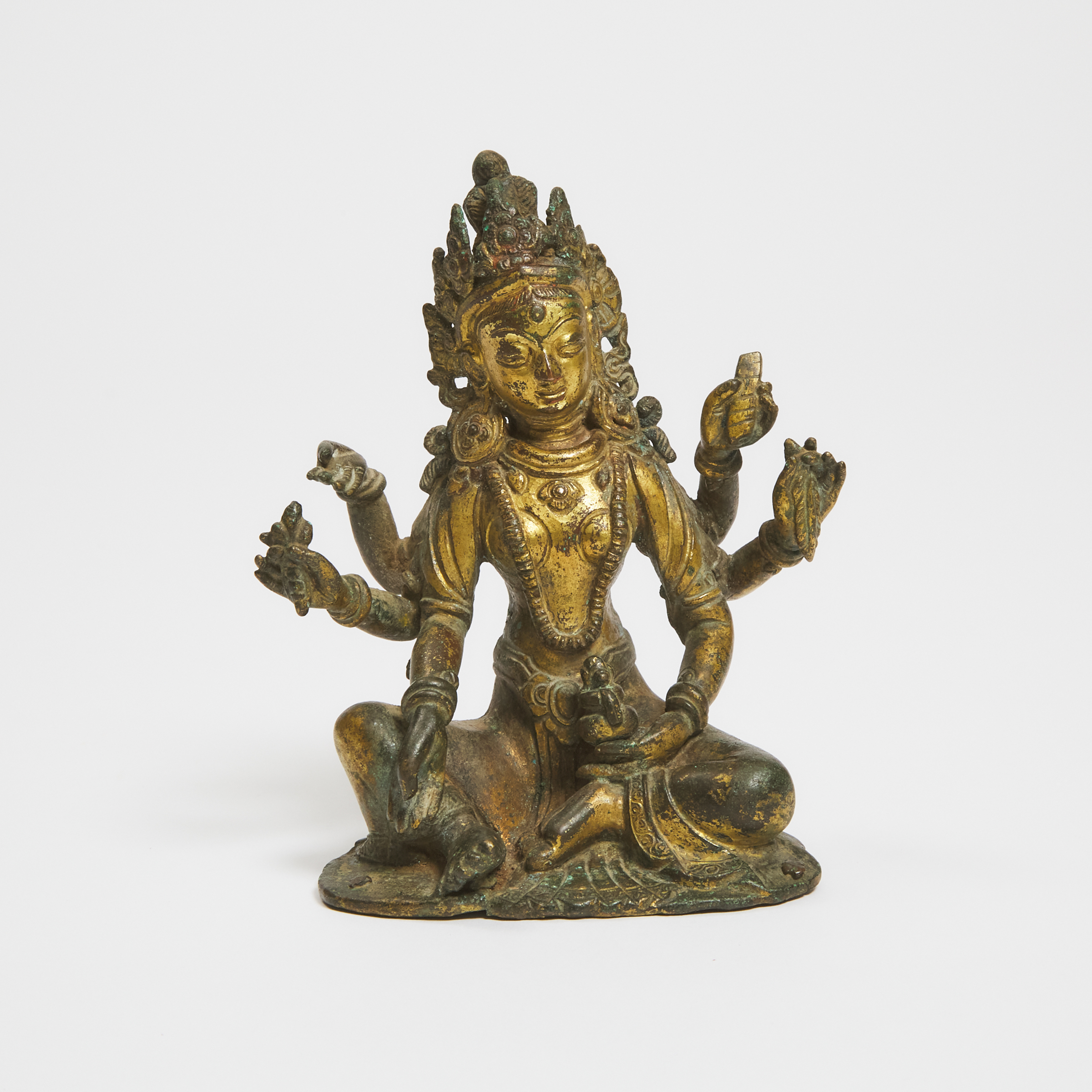 A Nepalese/Tibetan Gilt Bronze Figure of Vasudhara, 18th Century