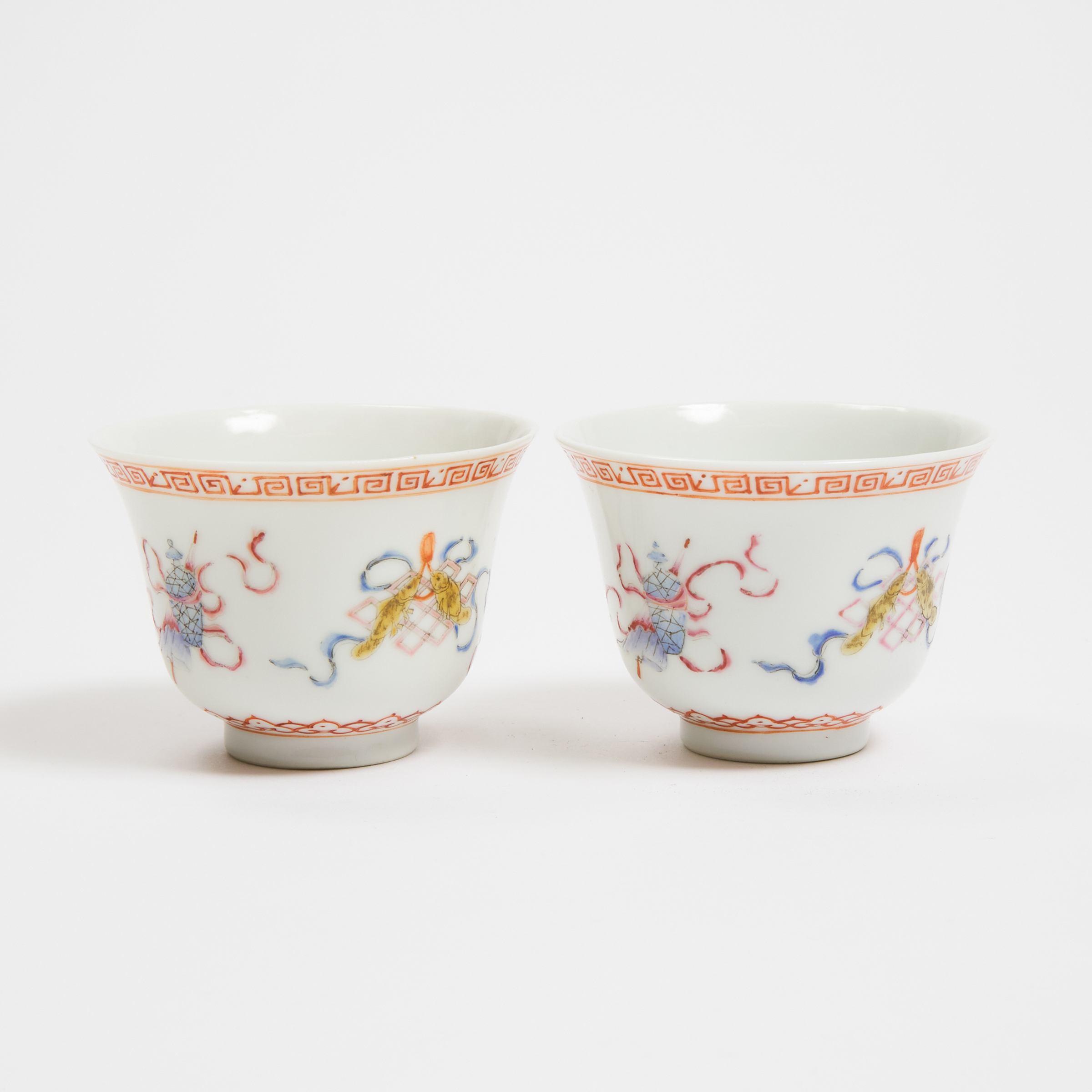 A Pair of Famille Rose 'Buddhist Emblems' Wine Cups, Qianlong Mark, Late Qing Dynasty