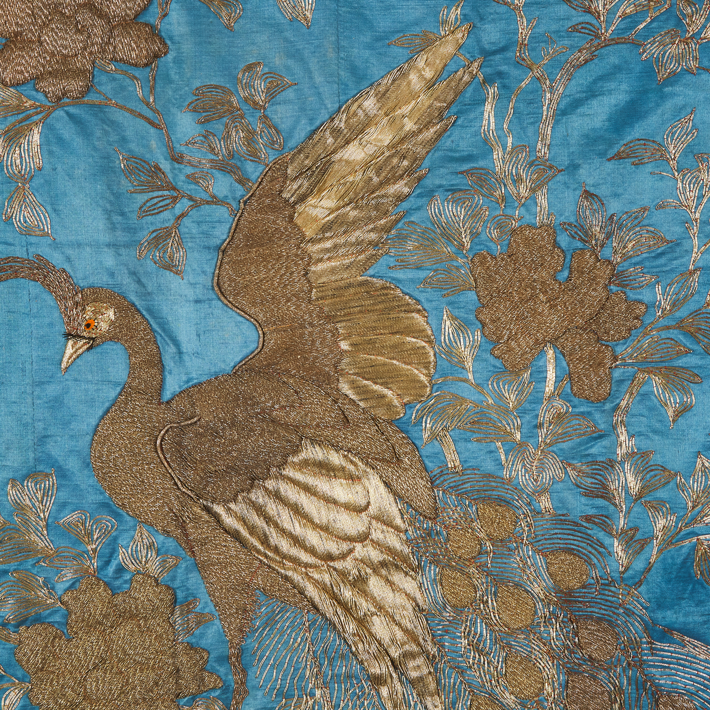 A Large Chinese Gold Silk Embroidered Blue-Ground 'Peacock' Panel, Qing Dynasty, 19th Century