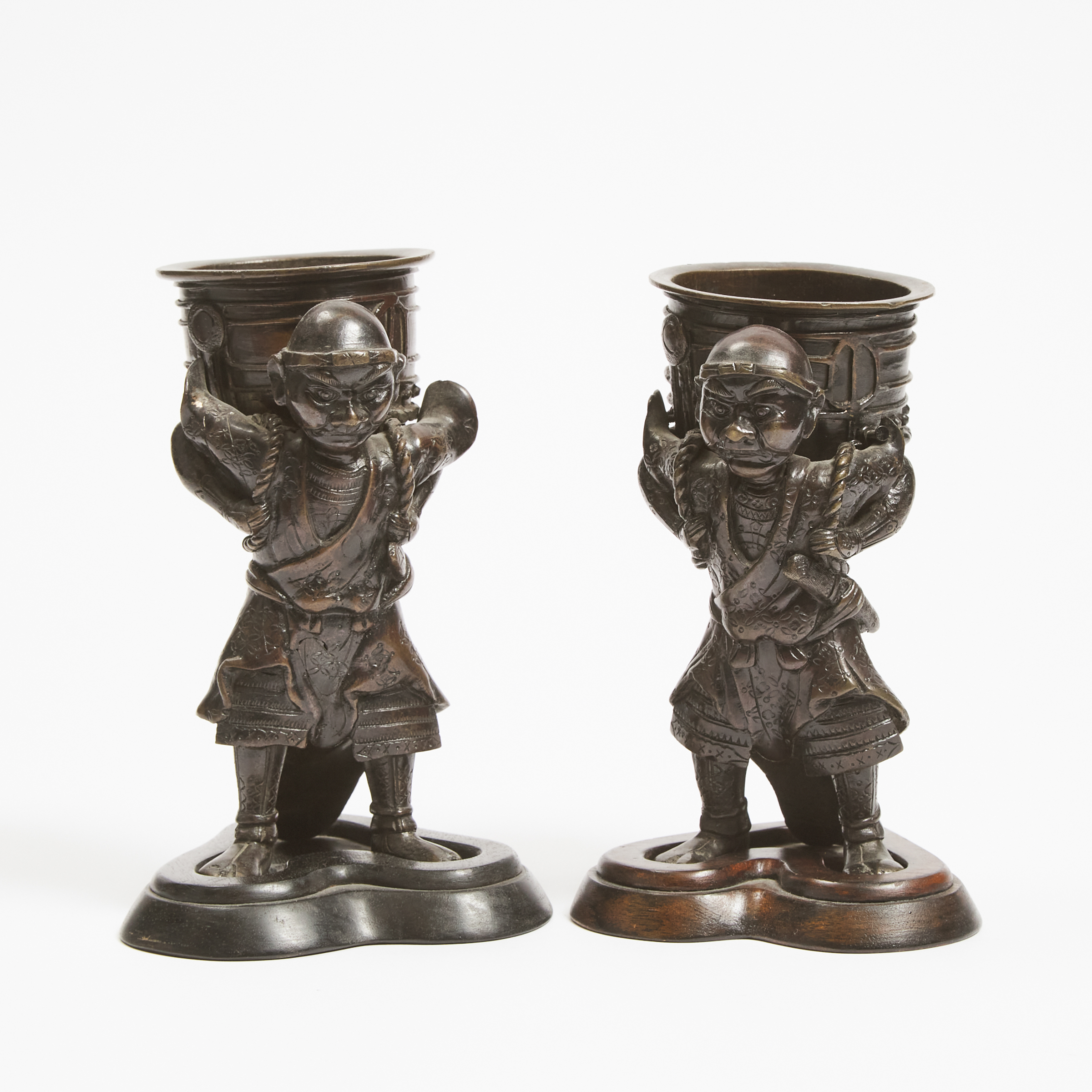 A Pair of Bronze Okimono Figures Carrying Temple Bells, Meiji Period (1868-1912)