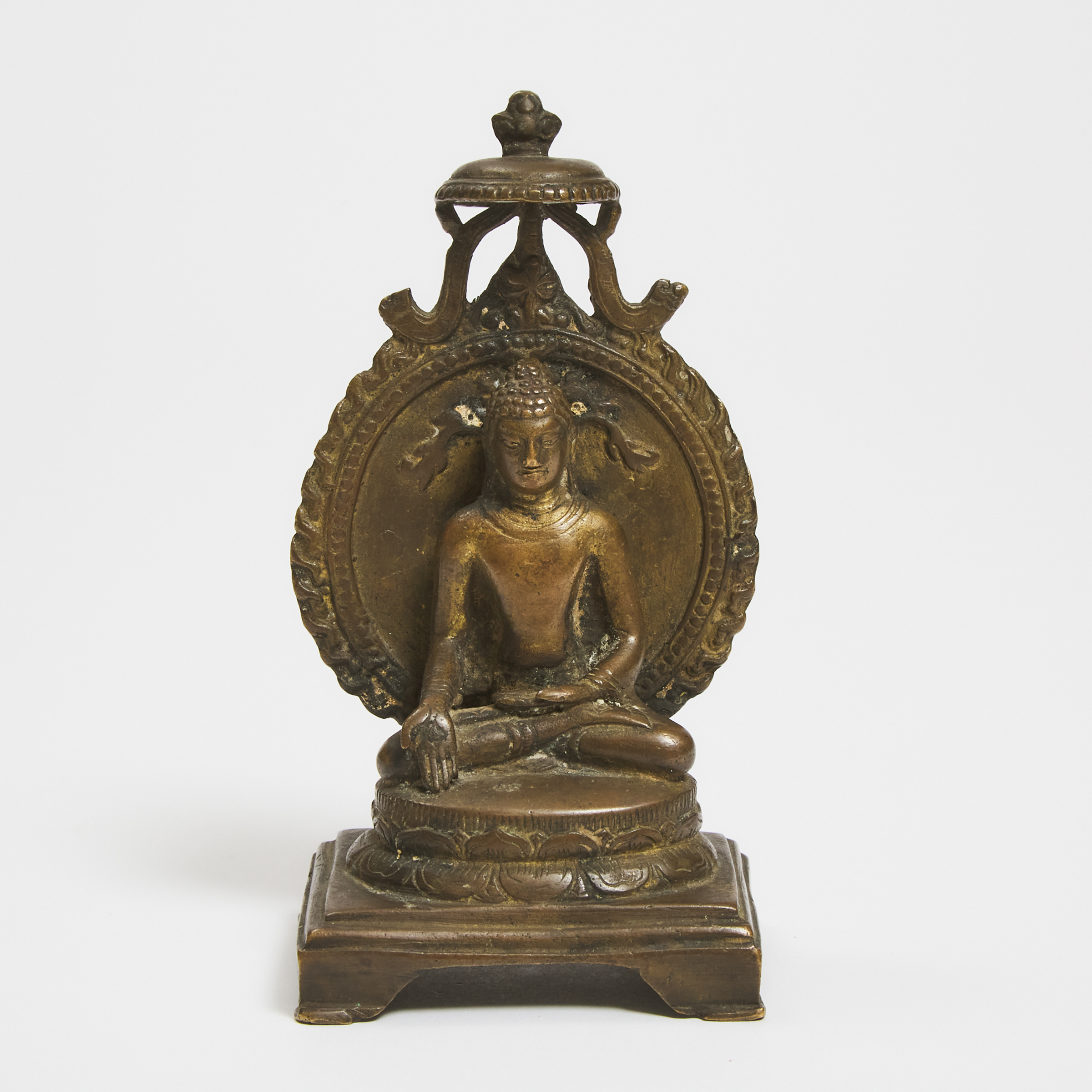 A Nepalese Bronze Figure of Buddha, 19th Century or Earlier