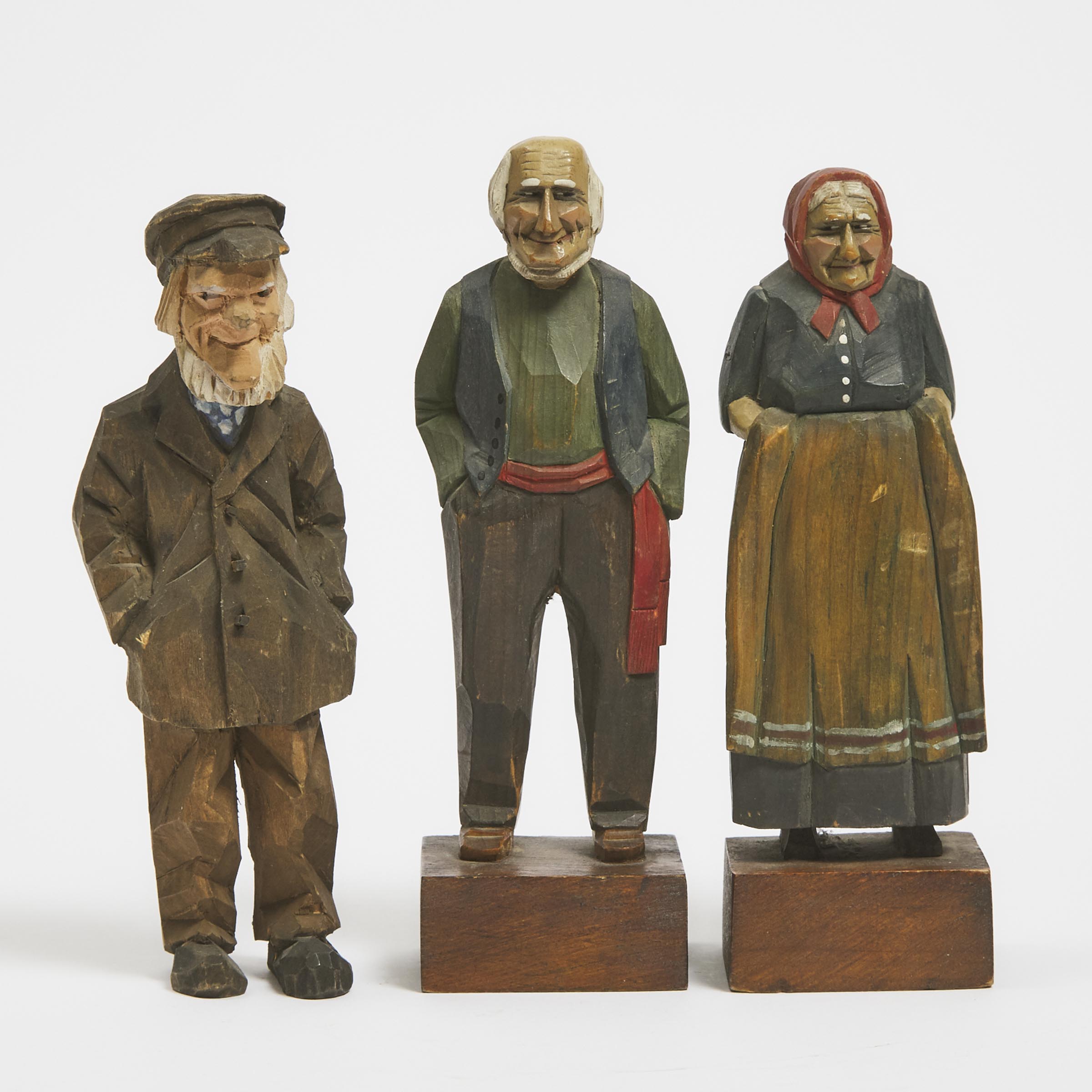 Three Quebec Flat Plane Carved Character Figures, mid 20th century