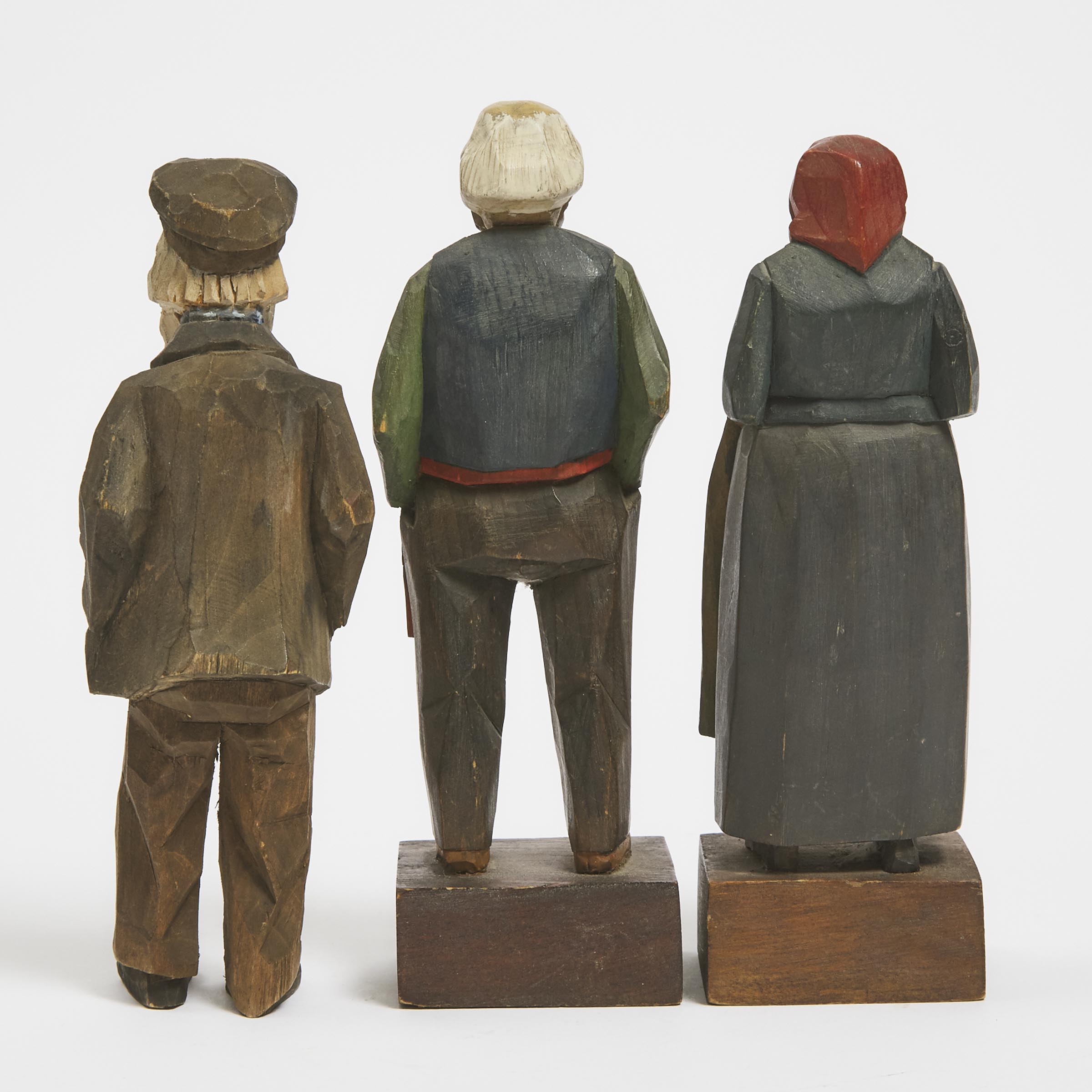 Three Quebec Flat Plane Carved Character Figures, mid 20th century