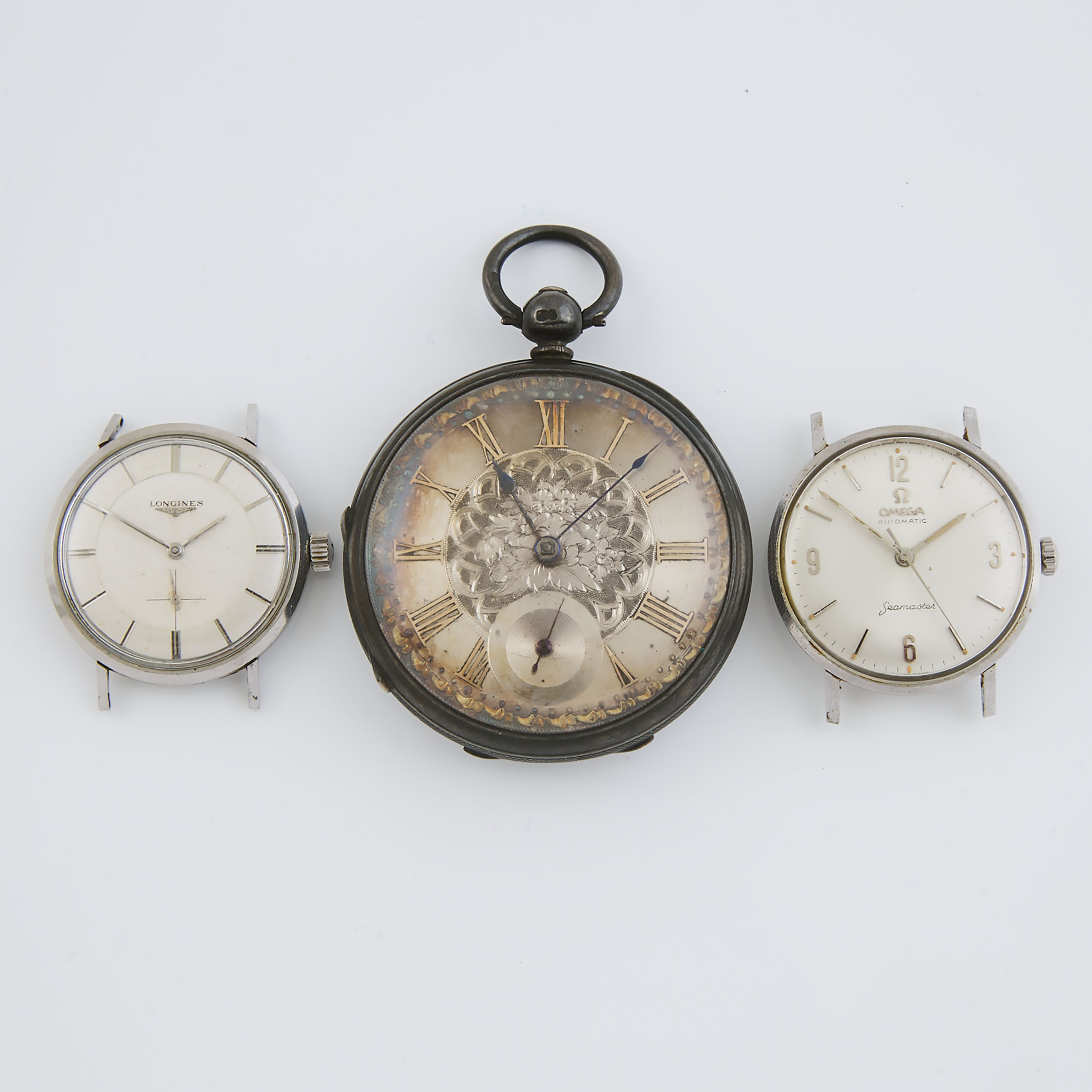 Two Wristwatches And A Pocket Watch