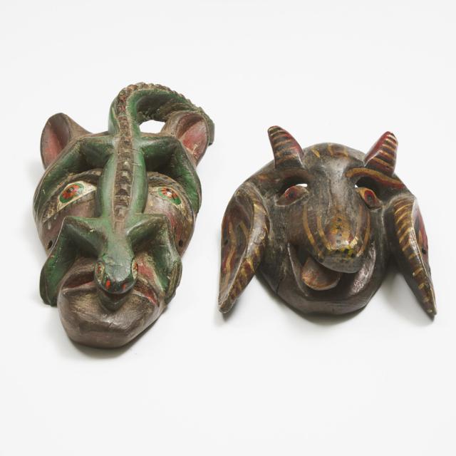 Two African Carved and Painted Wood Masks, mid to late 20th century