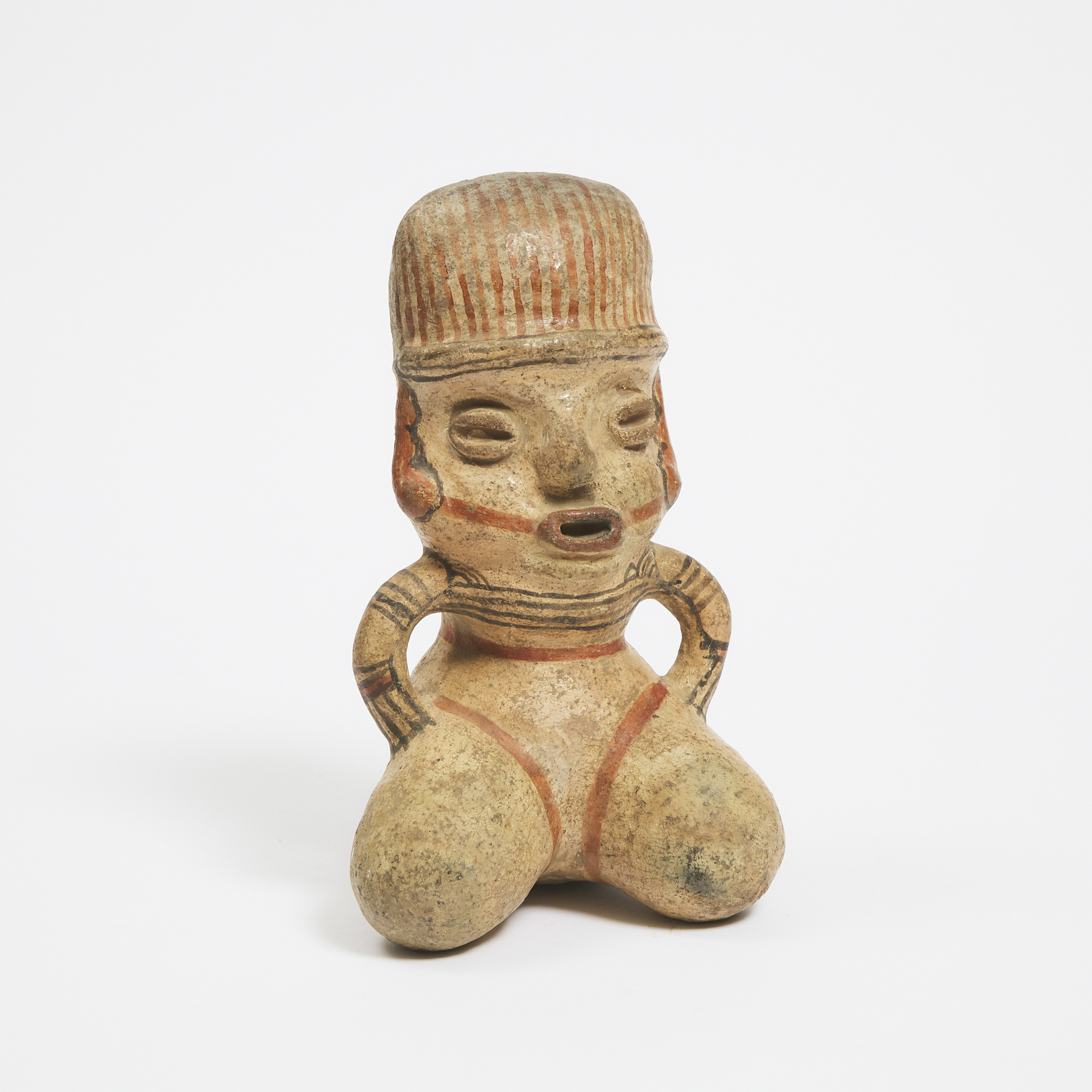 Pre-Columbian Polychrome Painted Pottery Kneeling Figure, possibly Nicoya, Costa Rica, 800-1200 AD