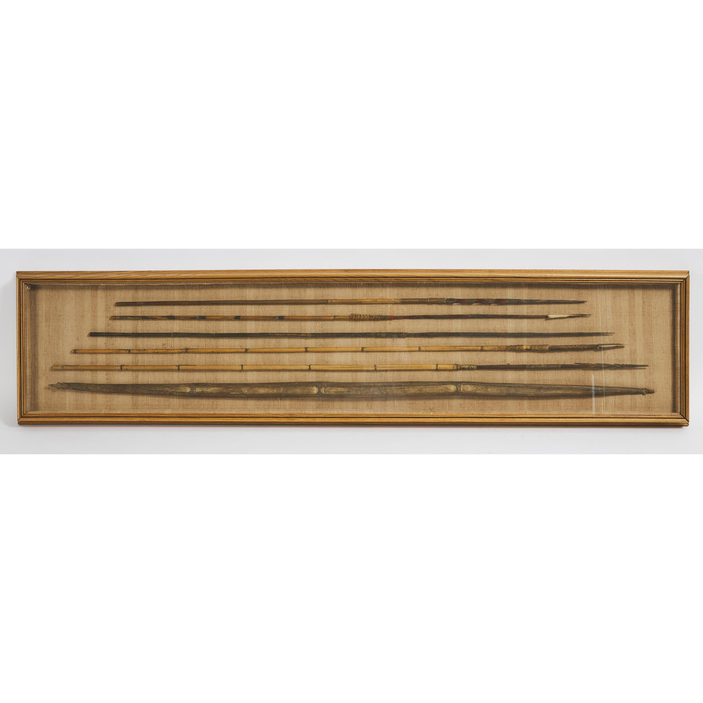 Framed Papua New Guinea Bow Shaft and Five Arrows, 20th century