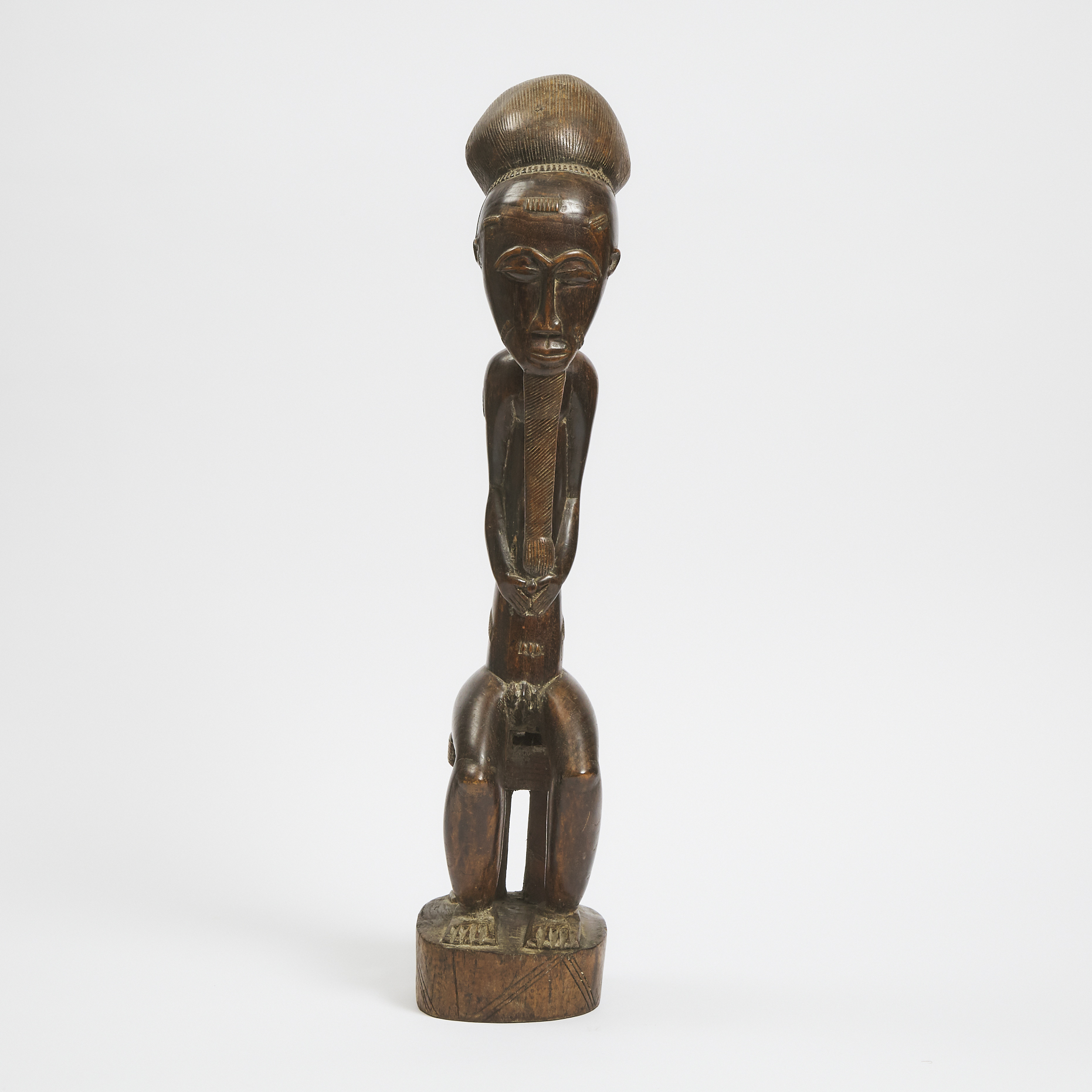 Baule Seated Male Figure, Ivory Coast, West Africa, mid 20th century