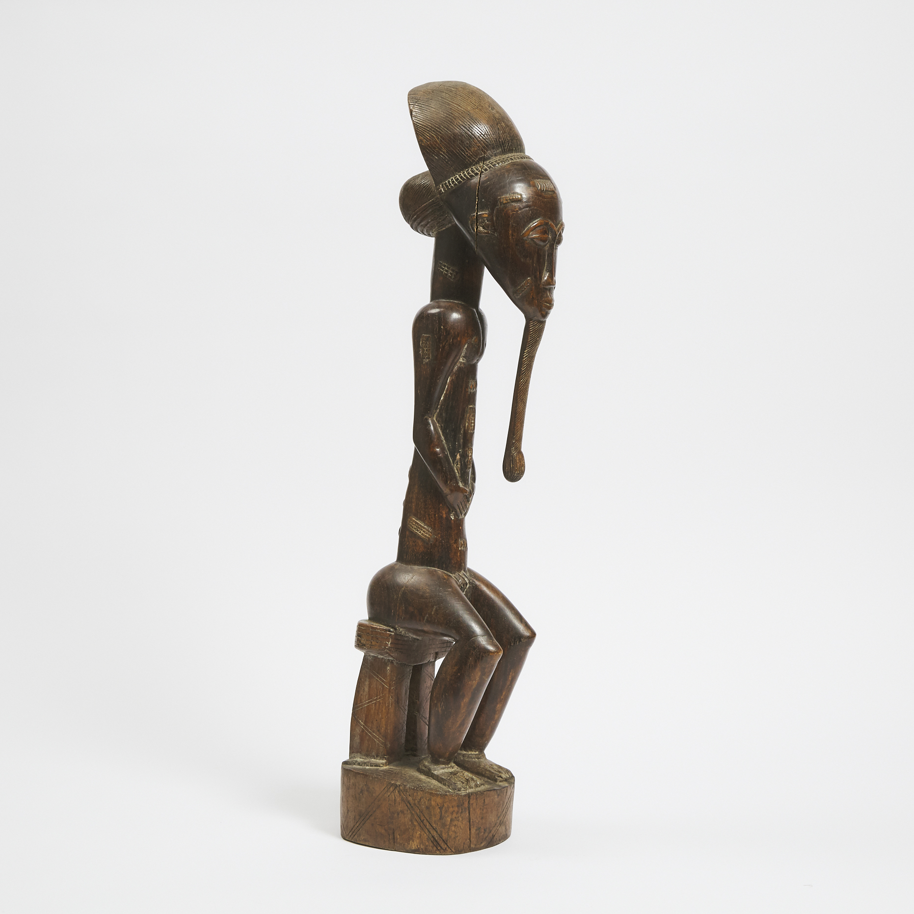 Baule Seated Male Figure, Ivory Coast, West Africa, mid 20th century