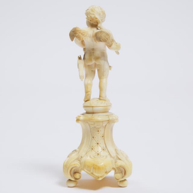 Small Dieppe Carved Ivory Figure of Cupid, 19th century