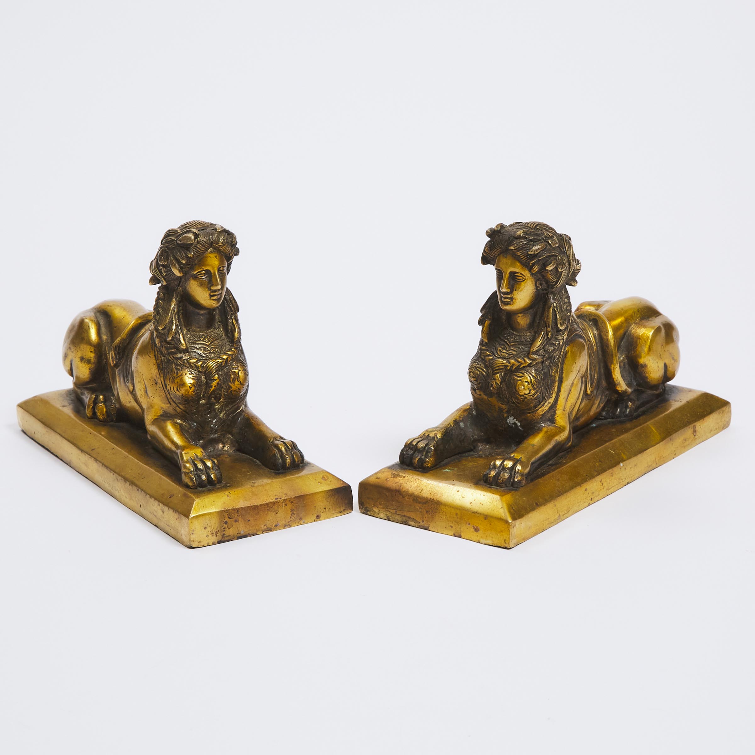 Pair of Gilt Brass Models of Sphinxes, 20th century