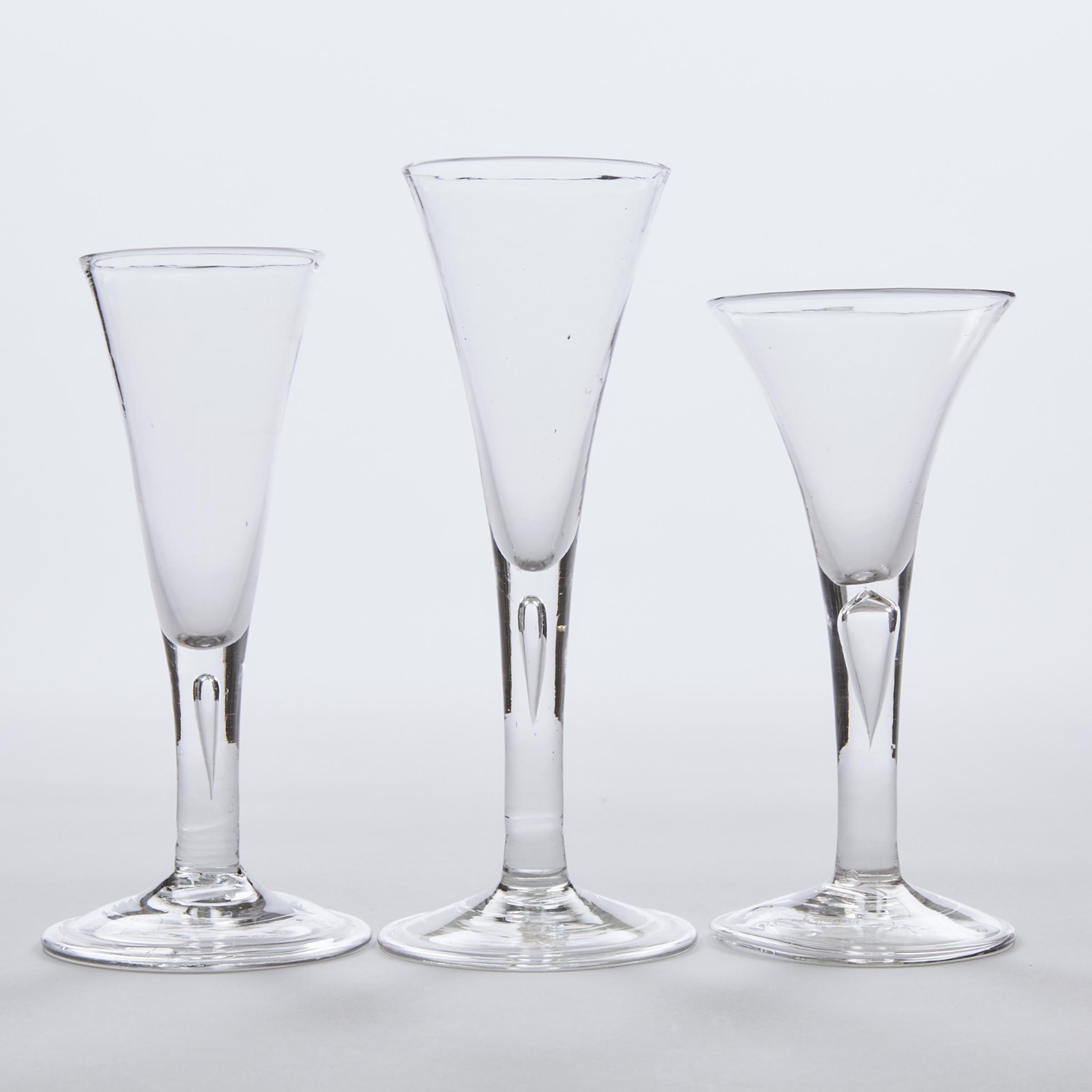 Three English Teared Stemmed Wine Glasses, mid-18th century