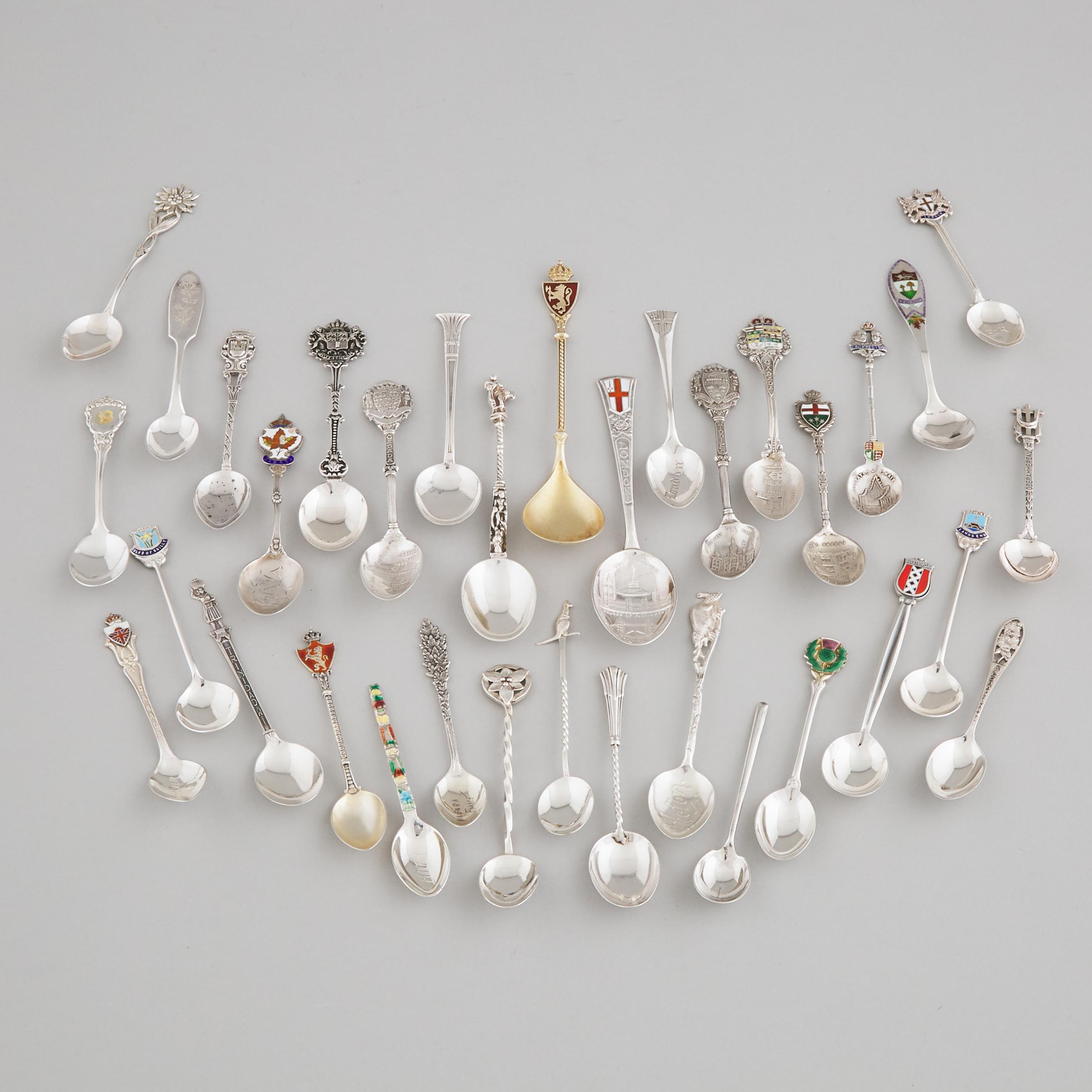 Thirty-Four English, Continental and North American Silver Souvenir Spoons, 20th century