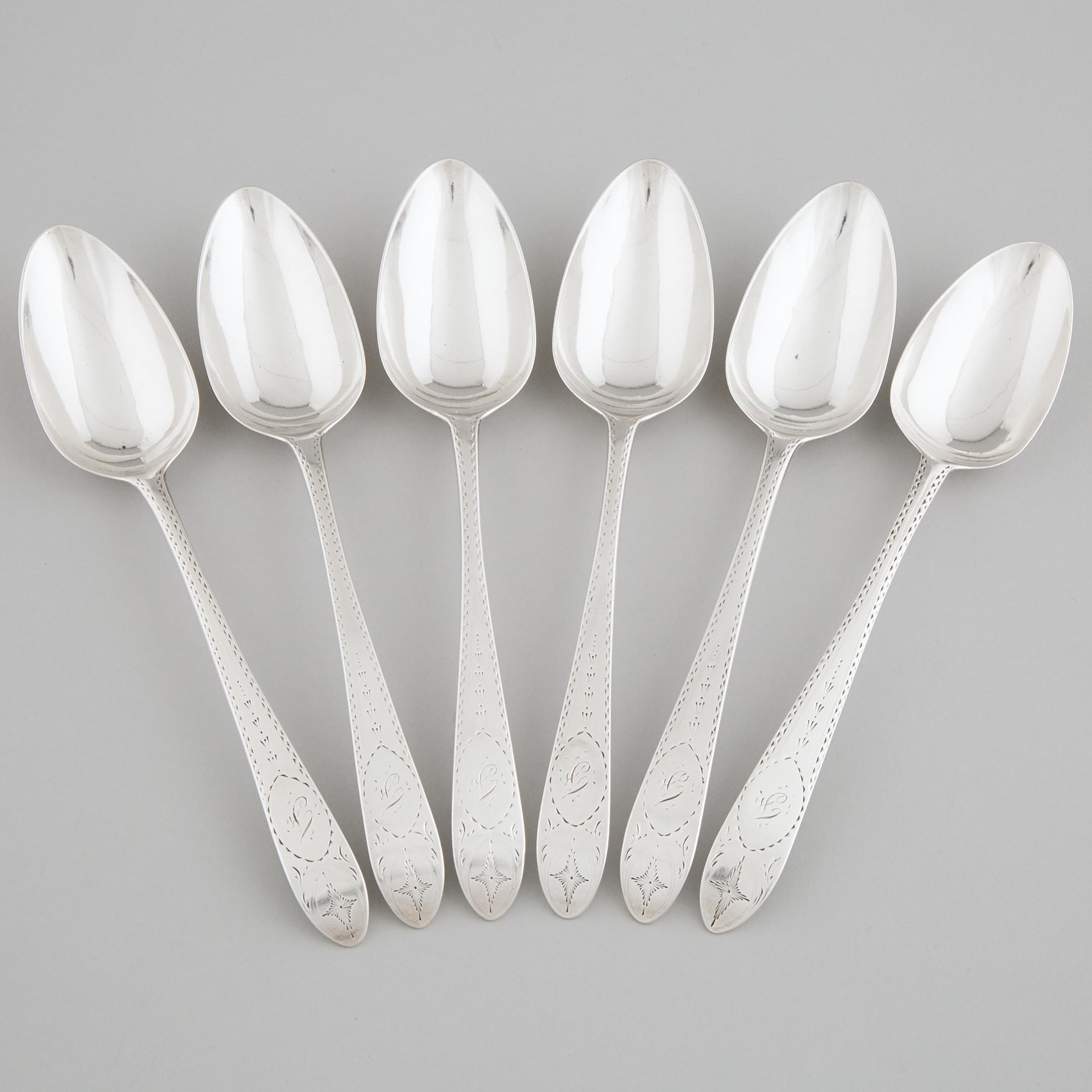 Six George III Irish Silver Bright-Cut Table Spoons, John Dalrymple, Dublin, 1792 (5), and another
