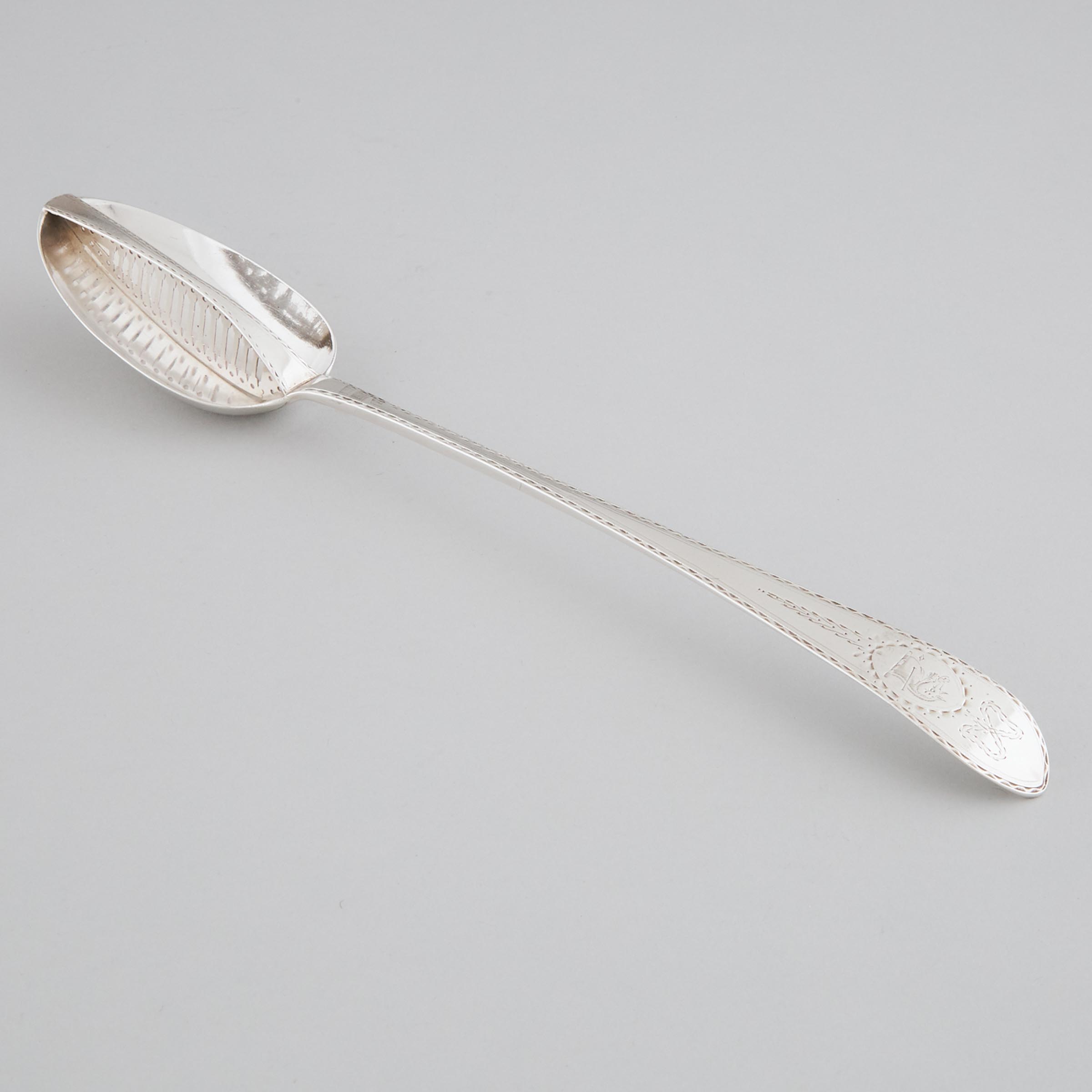 George III Irish Silver Bright-Cut Straining Serving Spoon, Michael Keating, Dublin, 1784