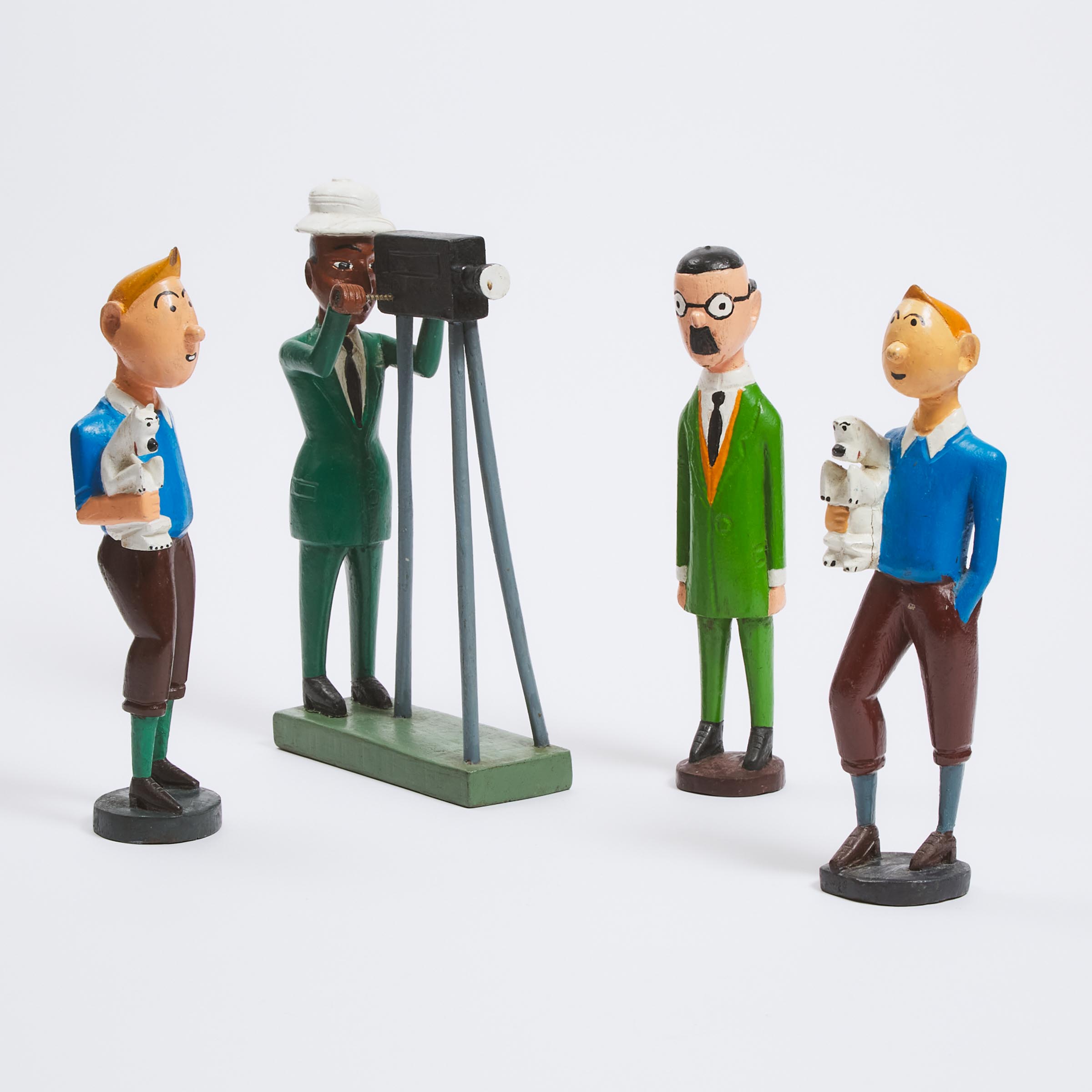 Four Carved and Polychromed Hardwood Models of 'Tintin' Characters, 20th century