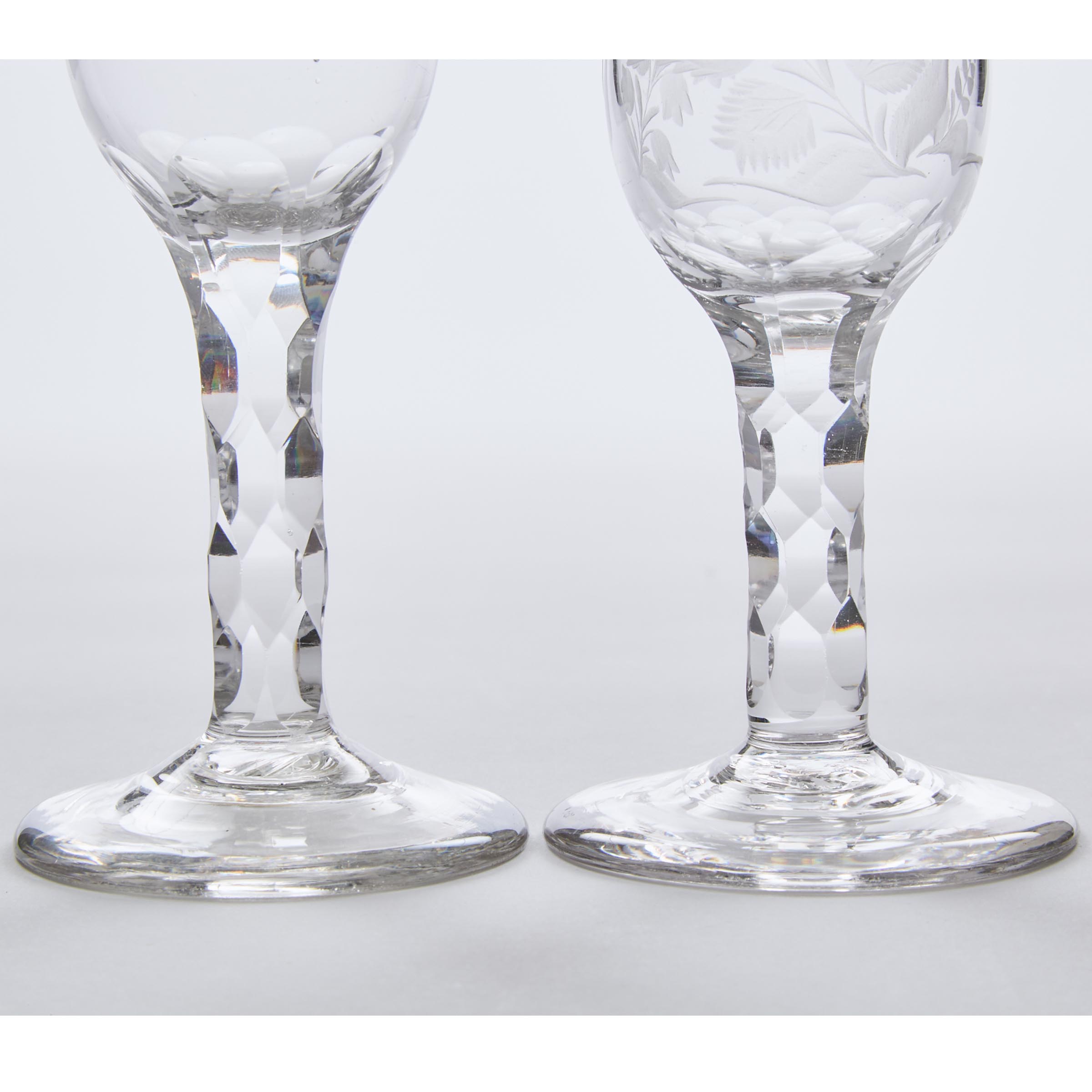 Two English Engraved Faceted Stemmed Wine Glasses, c.1765-80