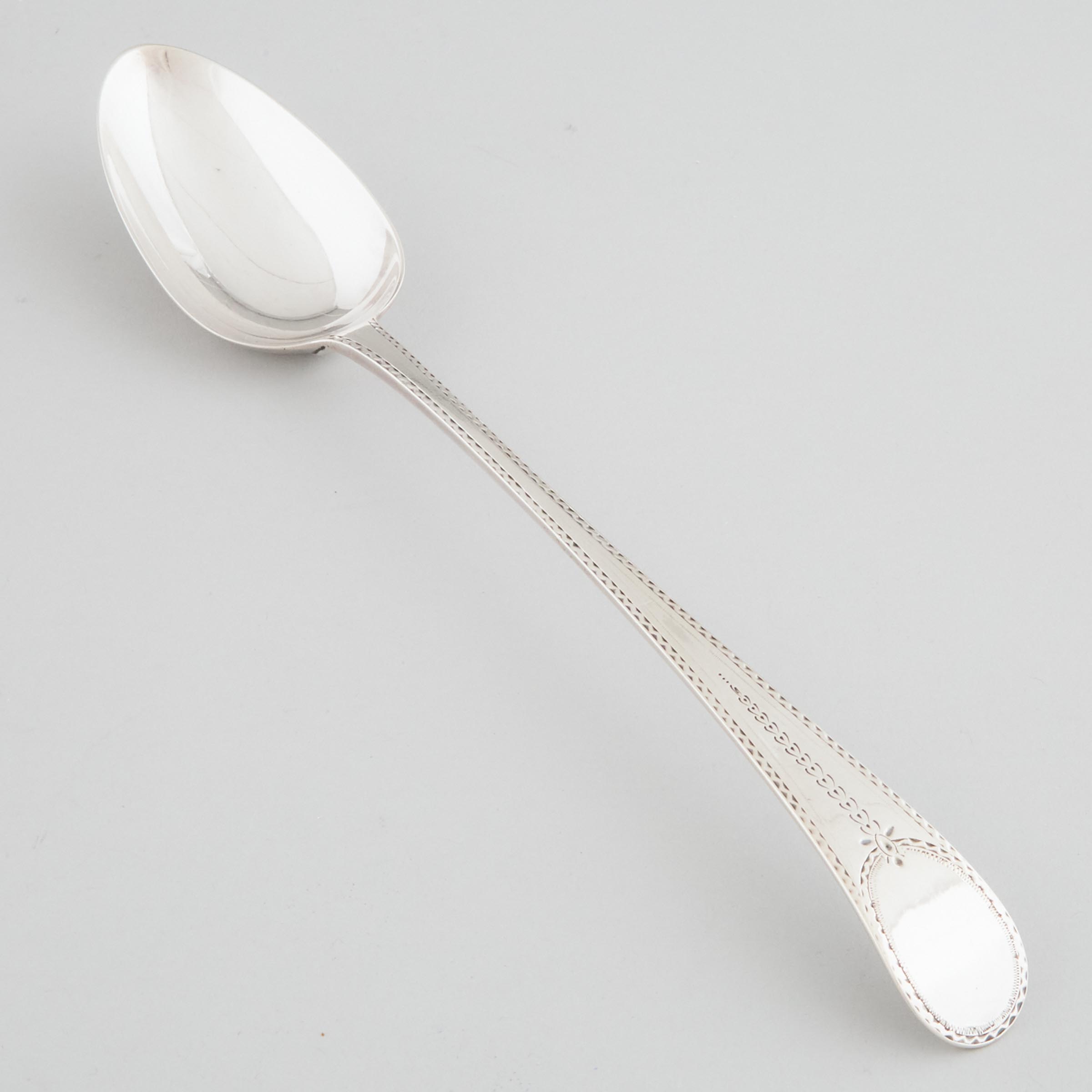 George III Silver Bright-Cut Serving Spoon, Hester Bateman, London, 1780