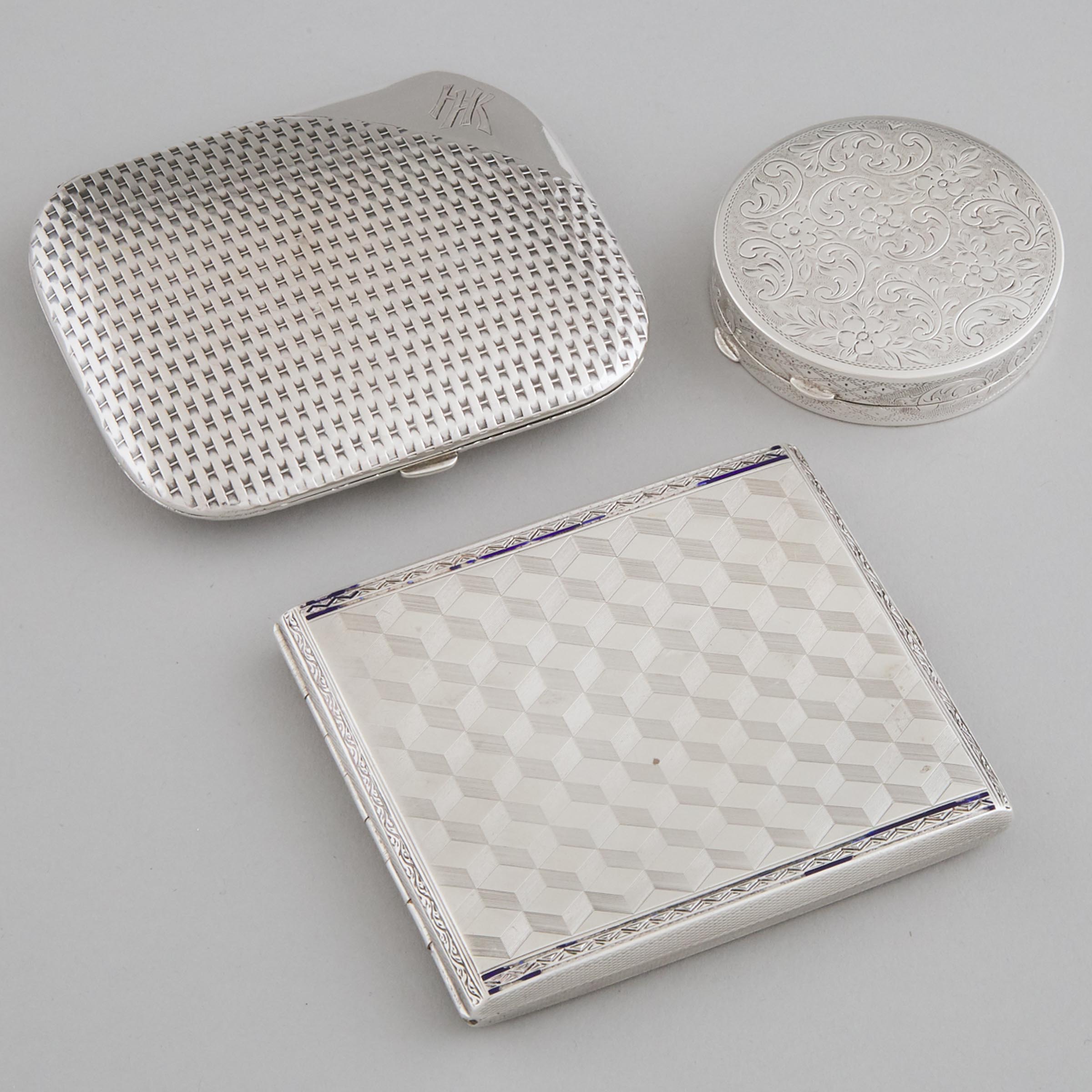 Two Continental Silver Cigarette Cases and a Circular Box, 20th century
