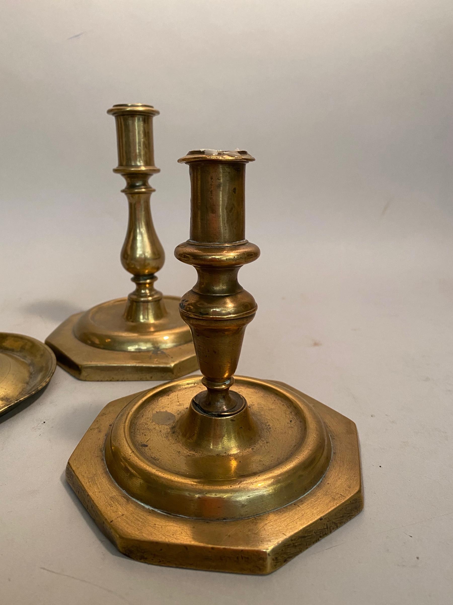 Three Brass Candlesticks, mid-late 17th century